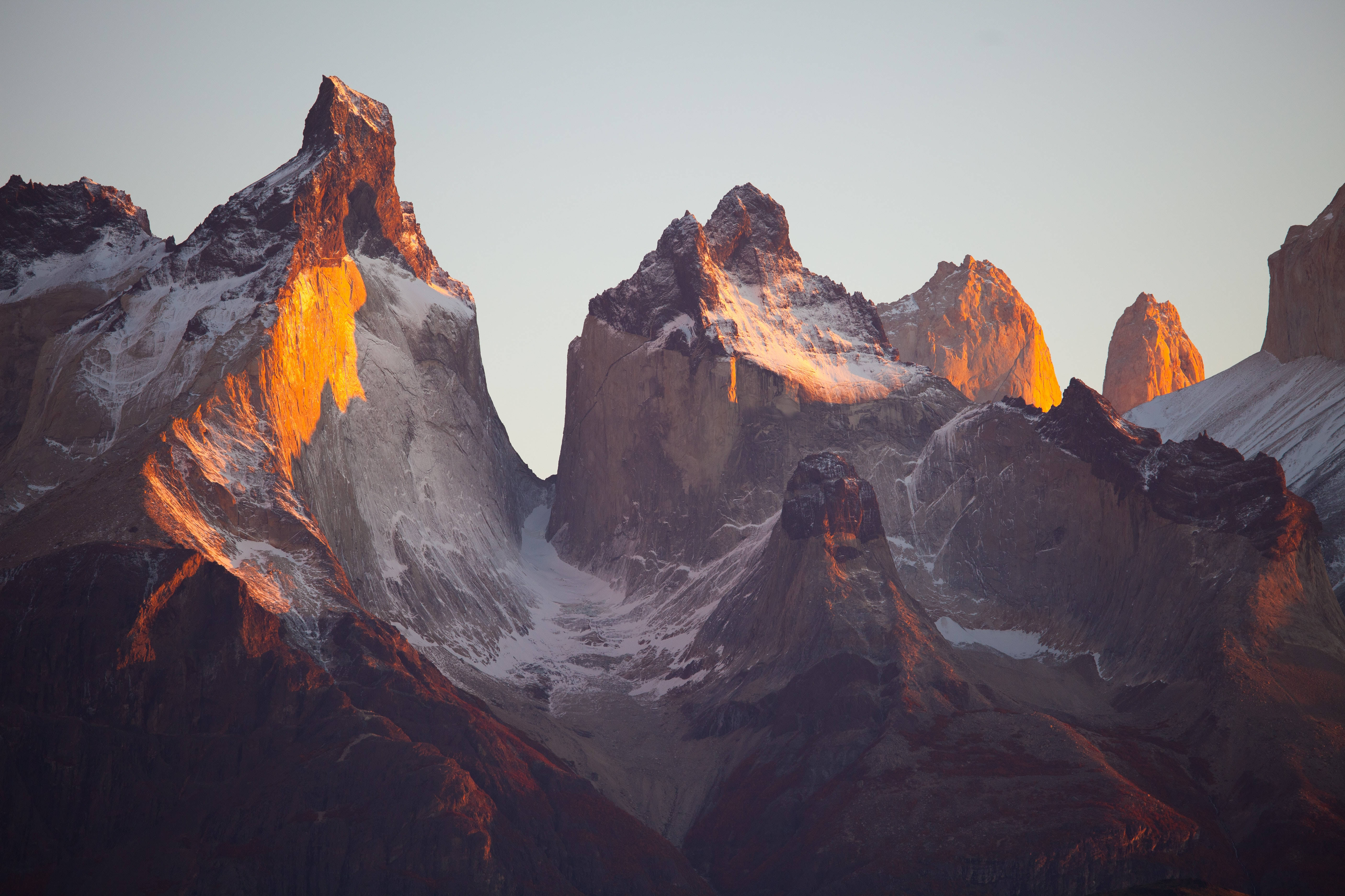 Torres Del Paine, snow-capped mountain peaks, golden light, 5K Desktop Wallpaper