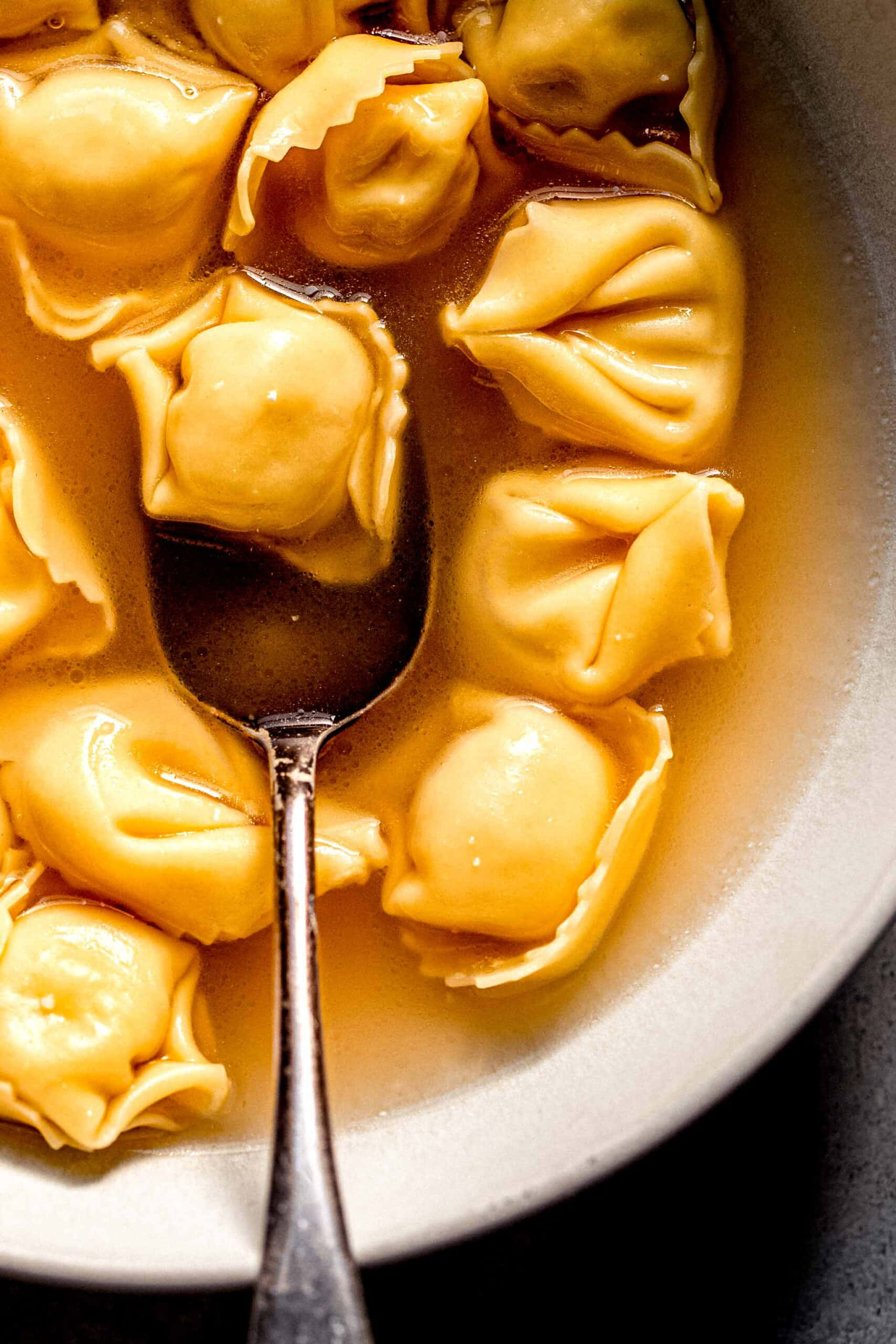 Tortellini In Brodo, golden dumplings, rich broth, 2K Phone Wallpaper