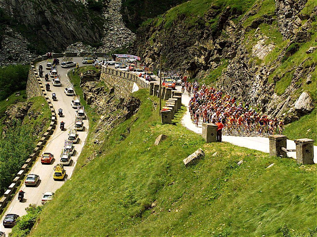 Tour de France, winding mountain road, cyclists in colorful jerseys, SD Desktop Wallpaper