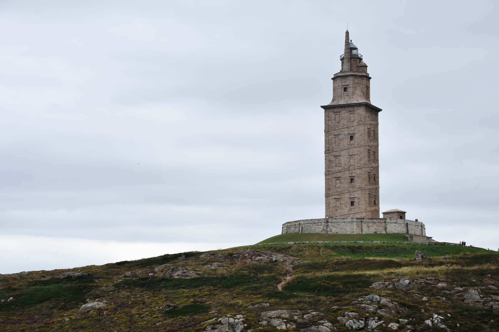 Tower Of Hercules, stone lighthouse, grassy hill, HD Desktop Wallpaper