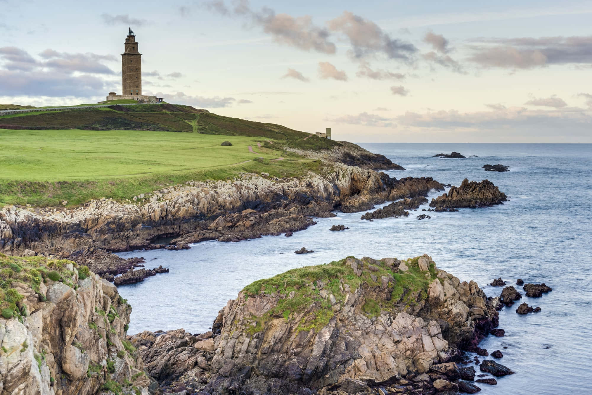 Tower Of Hercules, grassy cliff, rugged coastal rocks, Full HD Desktop Wallpaper