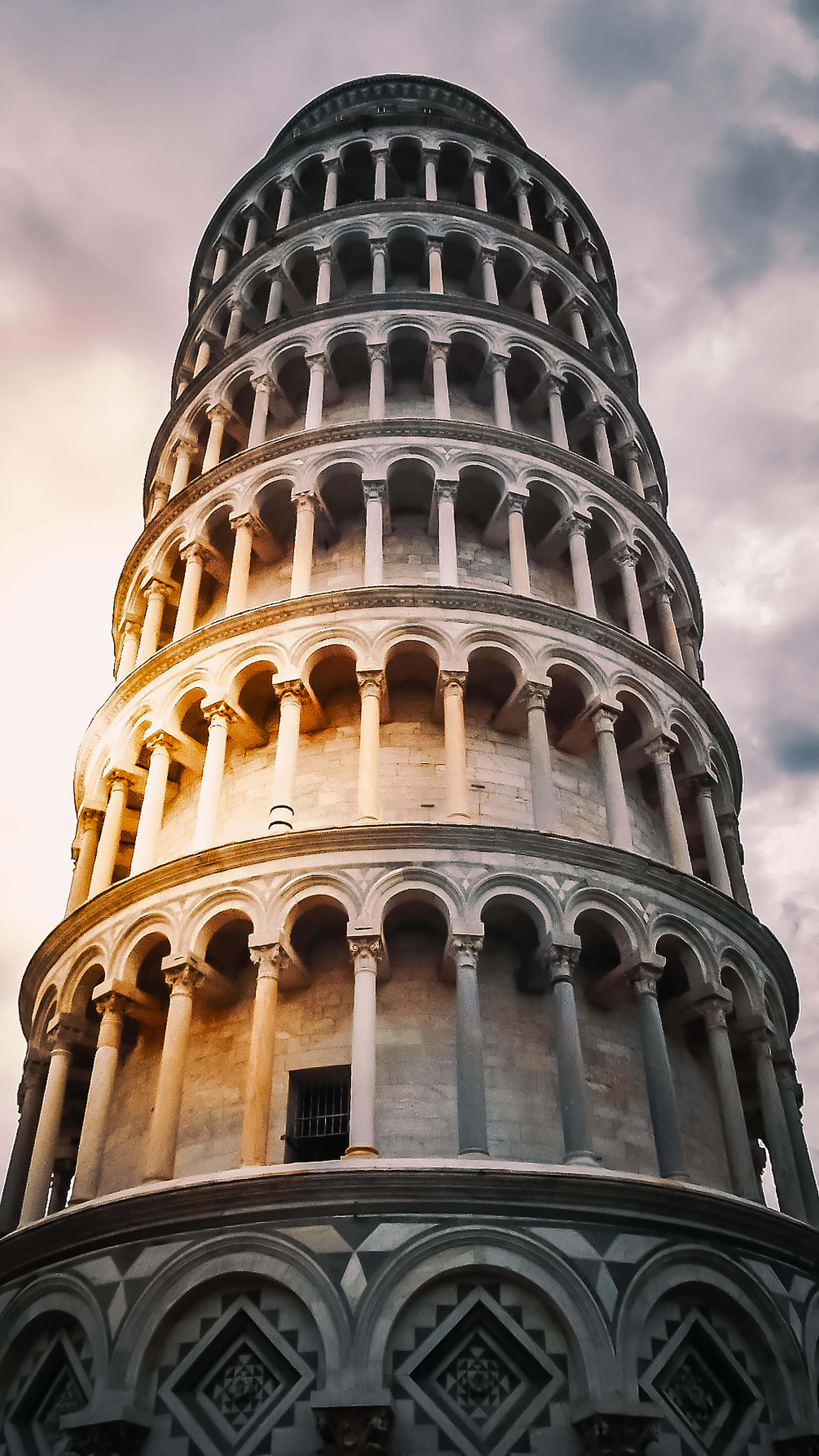 Tower Of Pisa, low-angle view, warm golden light, 8K Phone Wallpaper