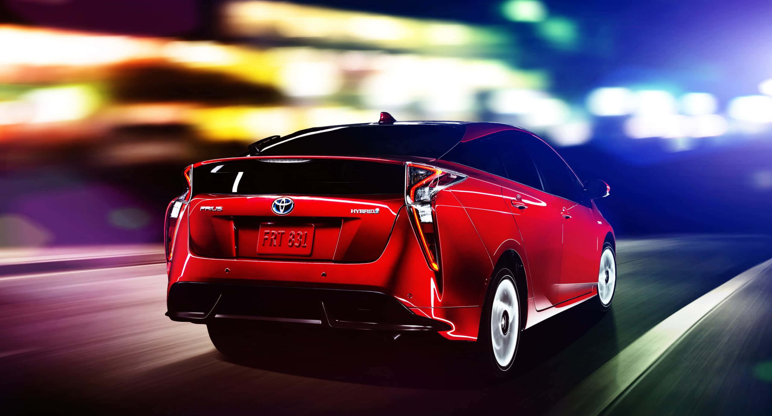 Toyota Prius, neon-lit city, night, 2K Desktop Wallpaper