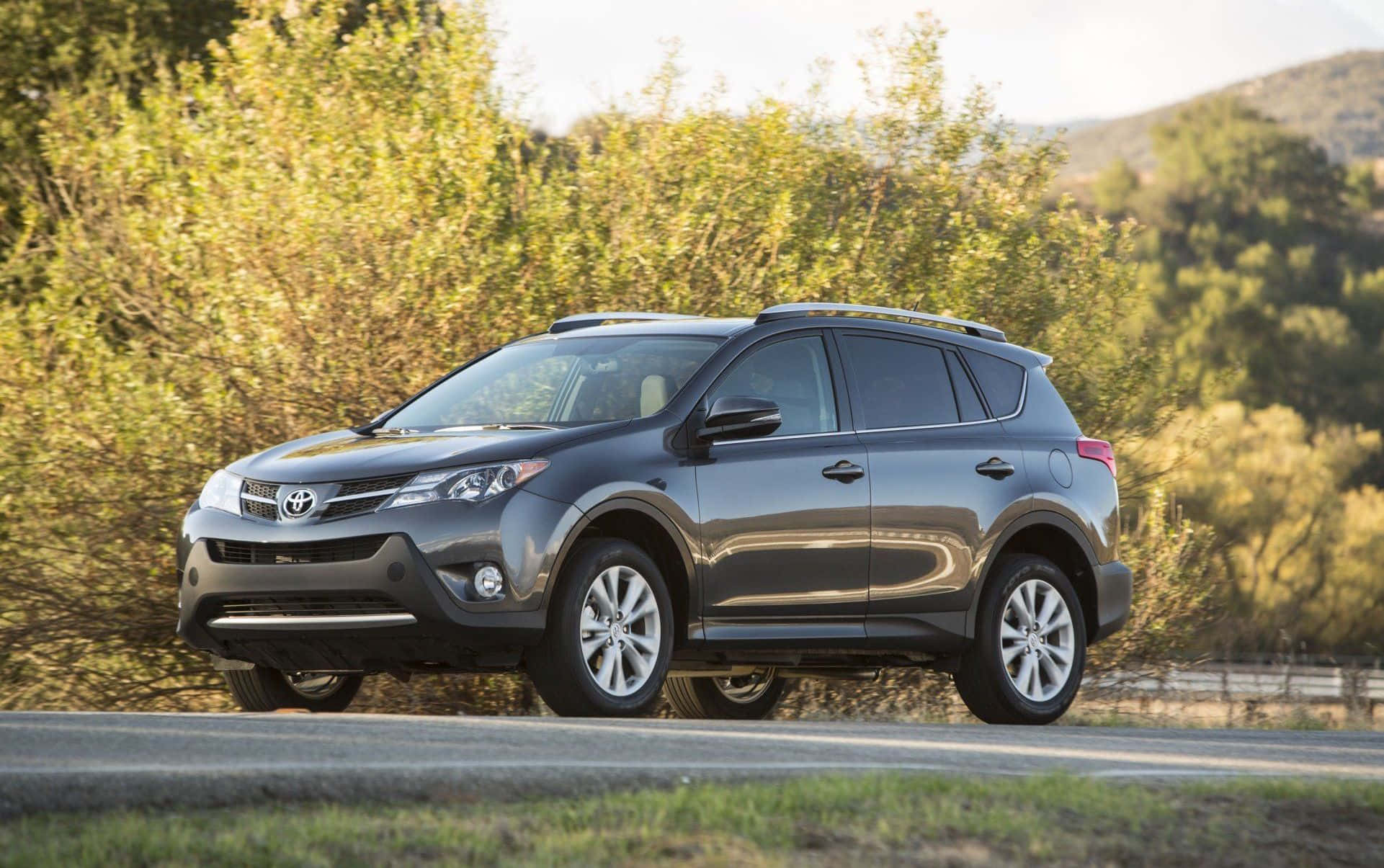 Toyota RAV4, sleek gray, winding road, Full HD Desktop Wallpaper