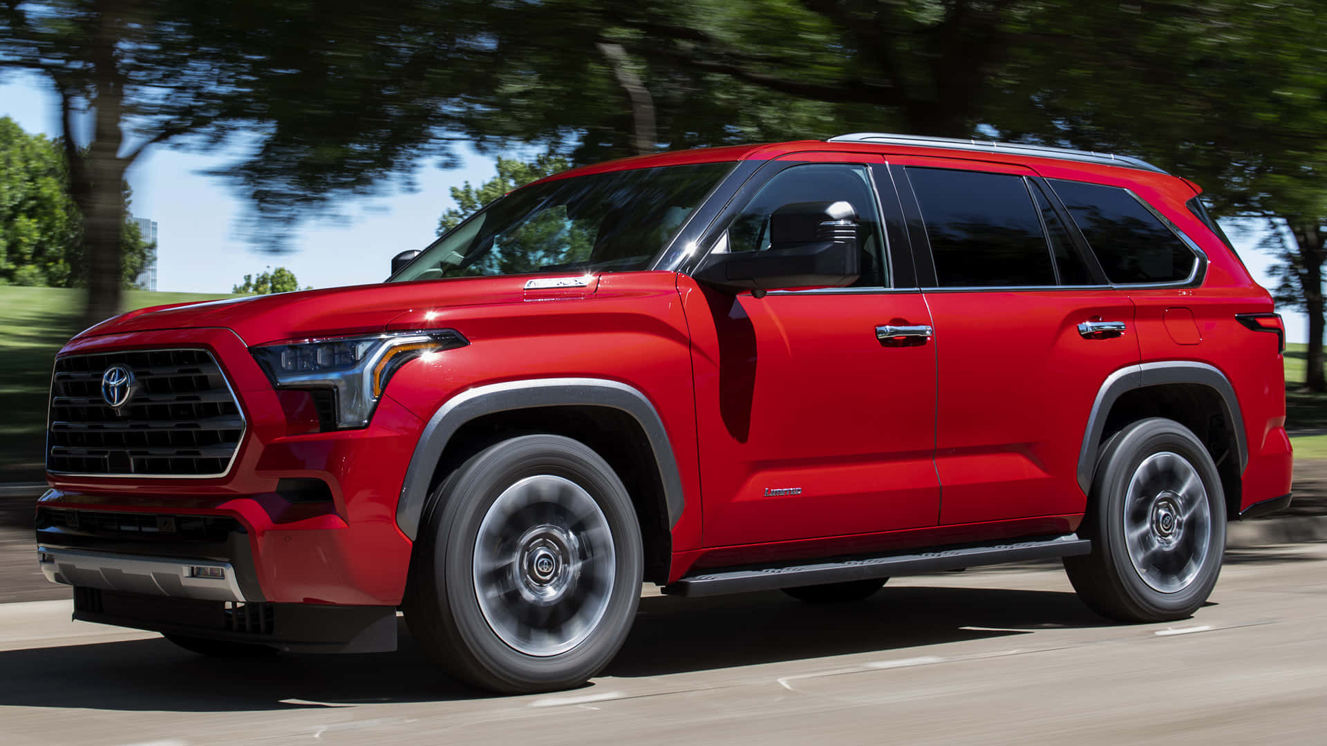 Toyota Sequoia, vibrant red, tree-lined road, Full HD Desktop Wallpaper