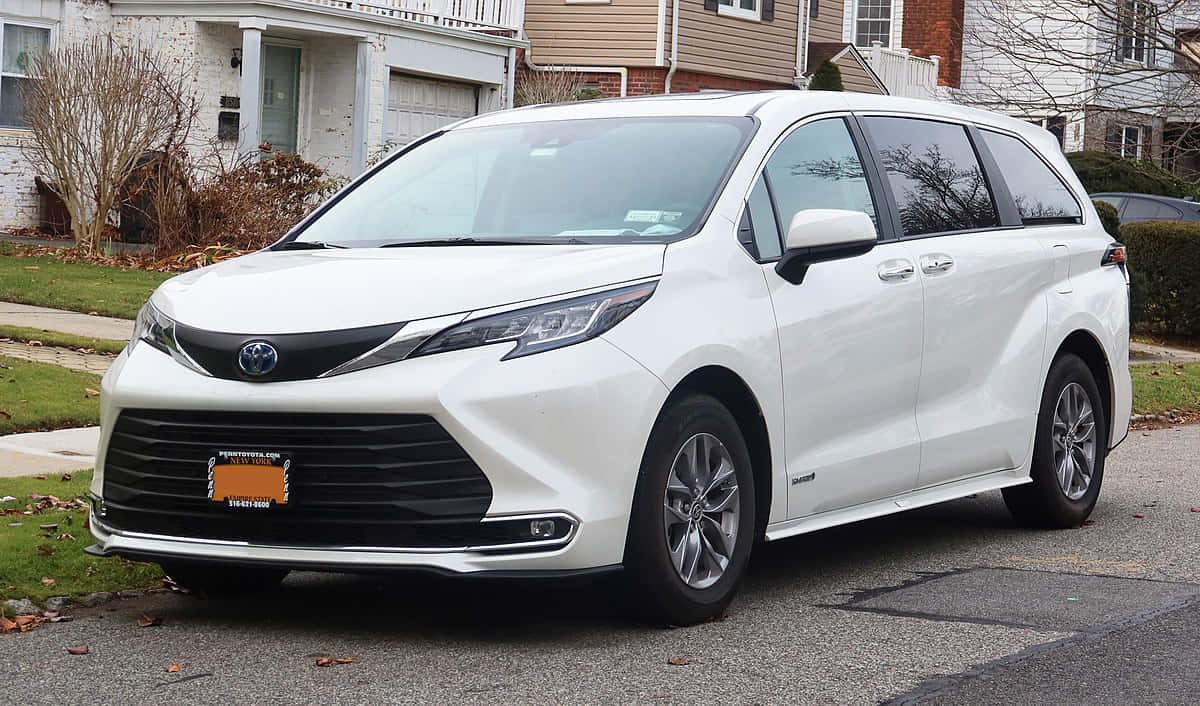 White Toyota Sienna, residential street, autumn leaves, SD Desktop Wallpaper