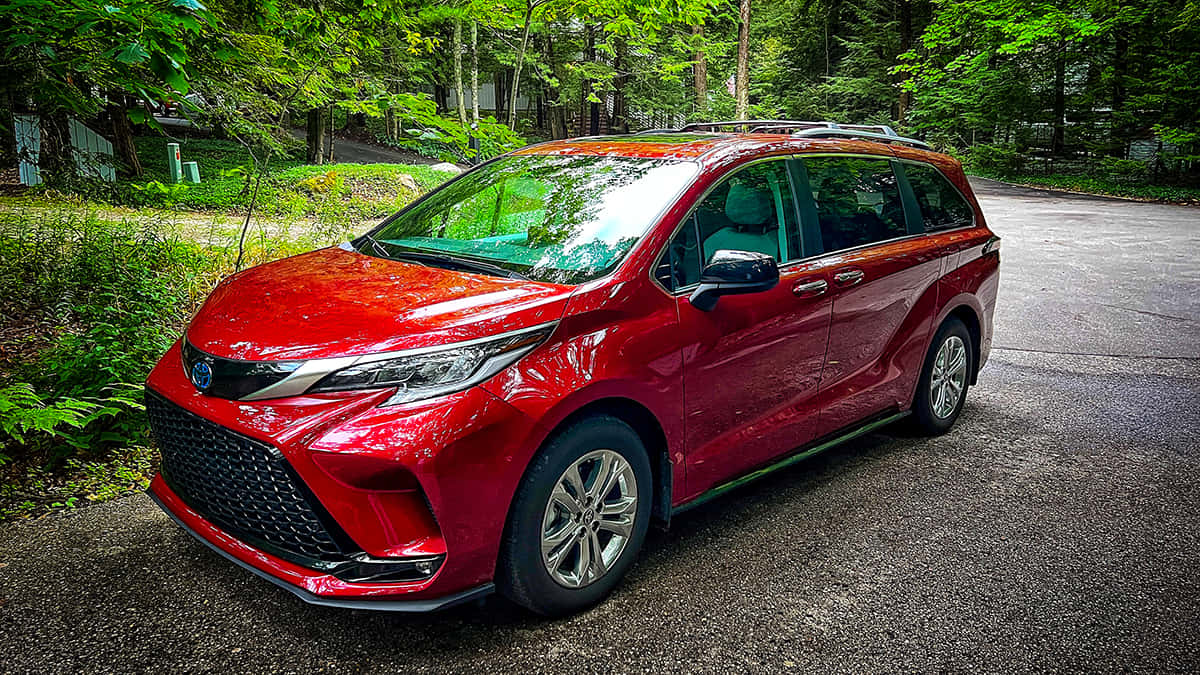 Red Toyota Sienna, minivan, forest setting, SD Desktop Wallpaper