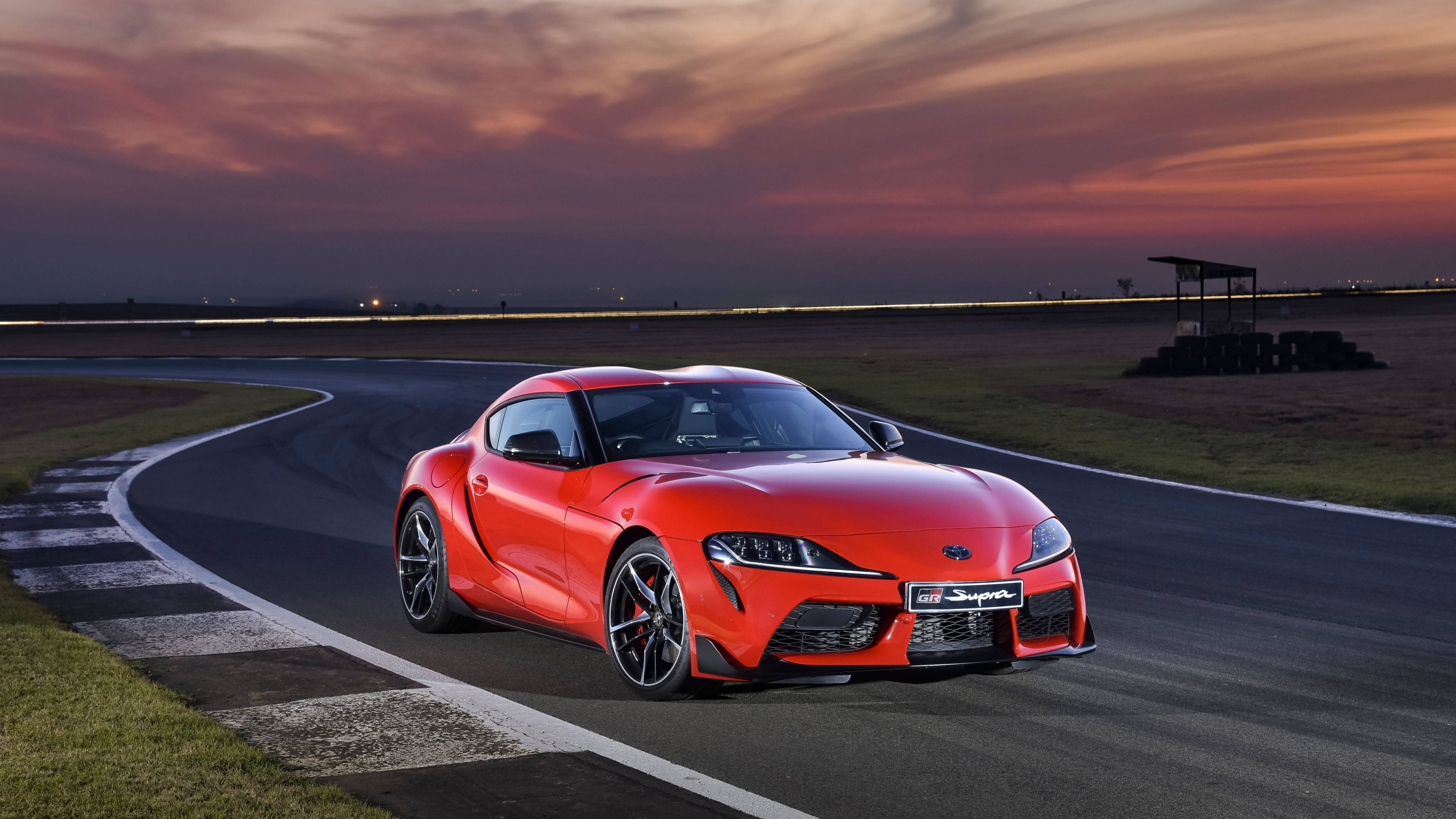 Toyota Supra, vibrant red, winding track, 4K Desktop Wallpaper