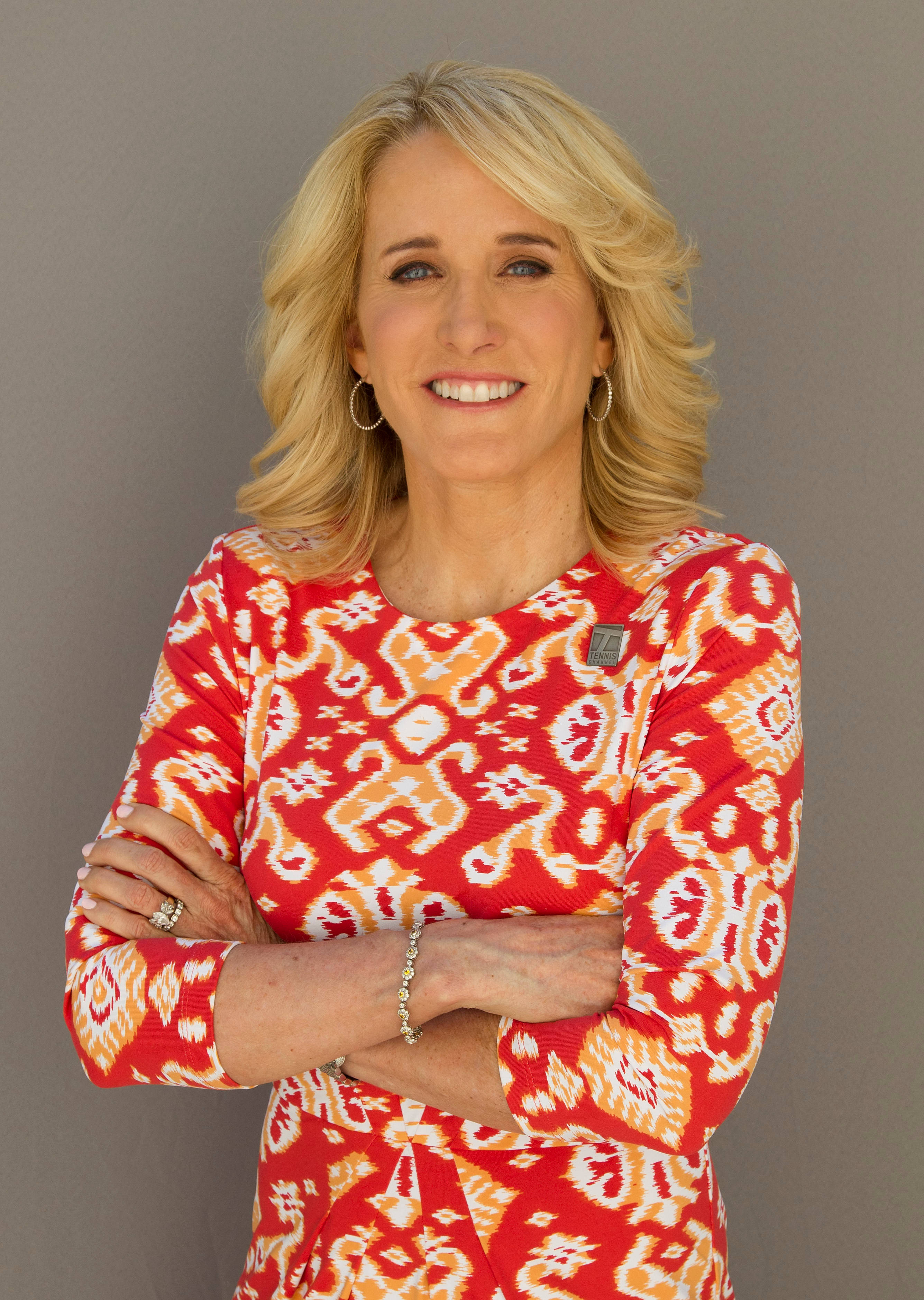 Tracy Austin, vibrant red and orange patterned dress, blonde woman, 2K Phone Wallpaper