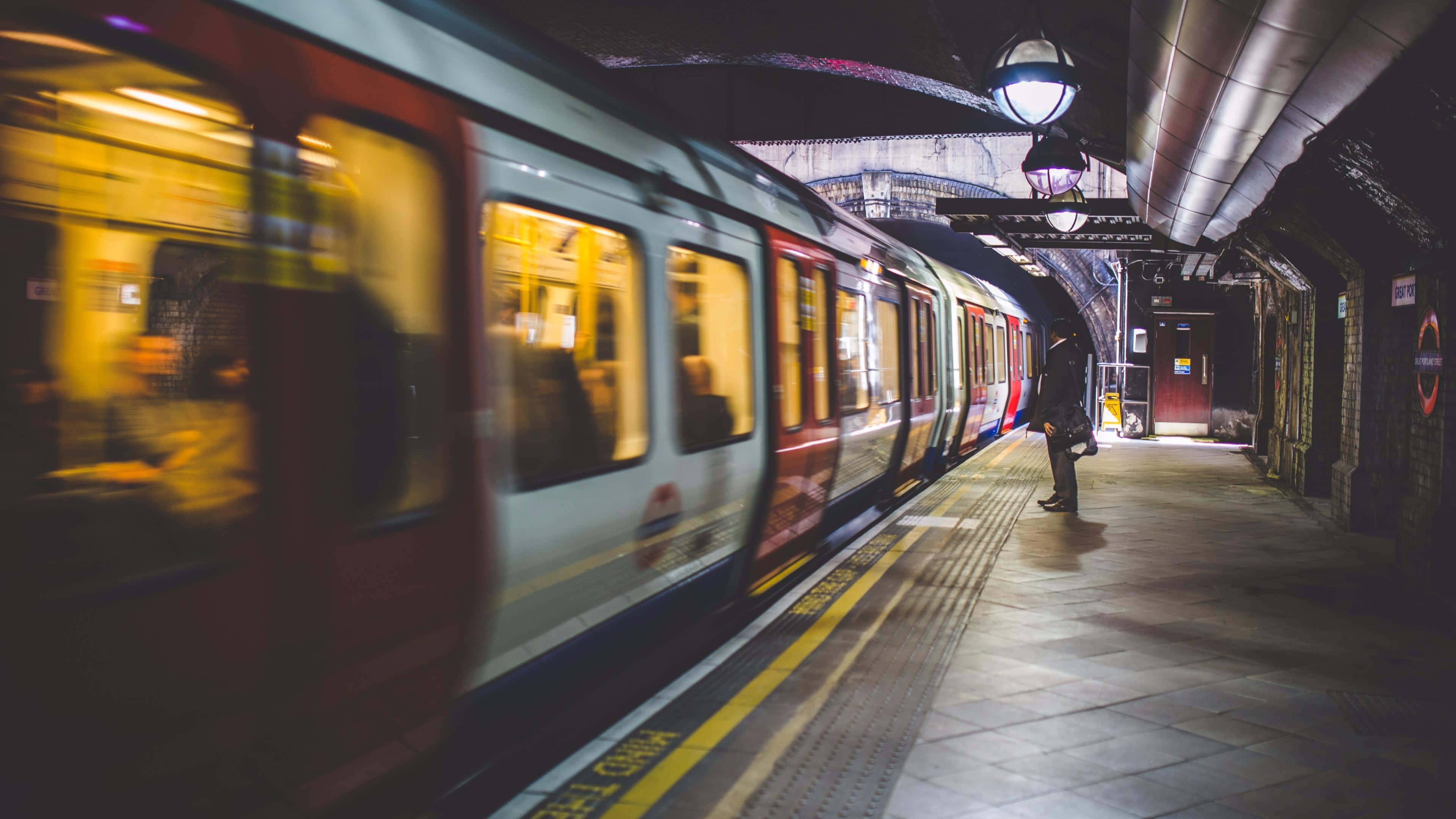 red and white train, dimly lit subway platform, night, 4K Desktop Wallpaper