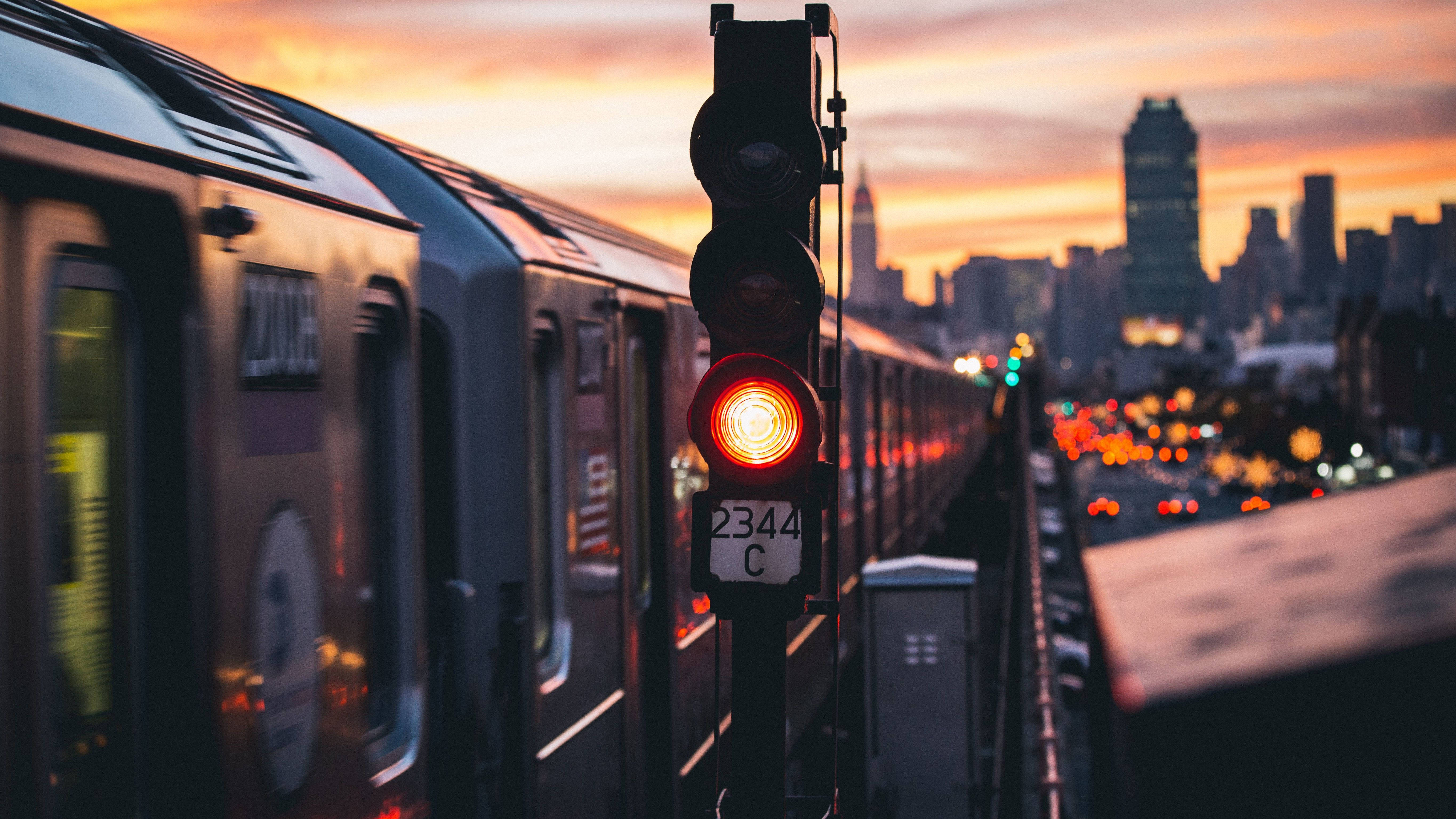 Train, glowing red signal, vibrant sunset, 5K Desktop Wallpaper