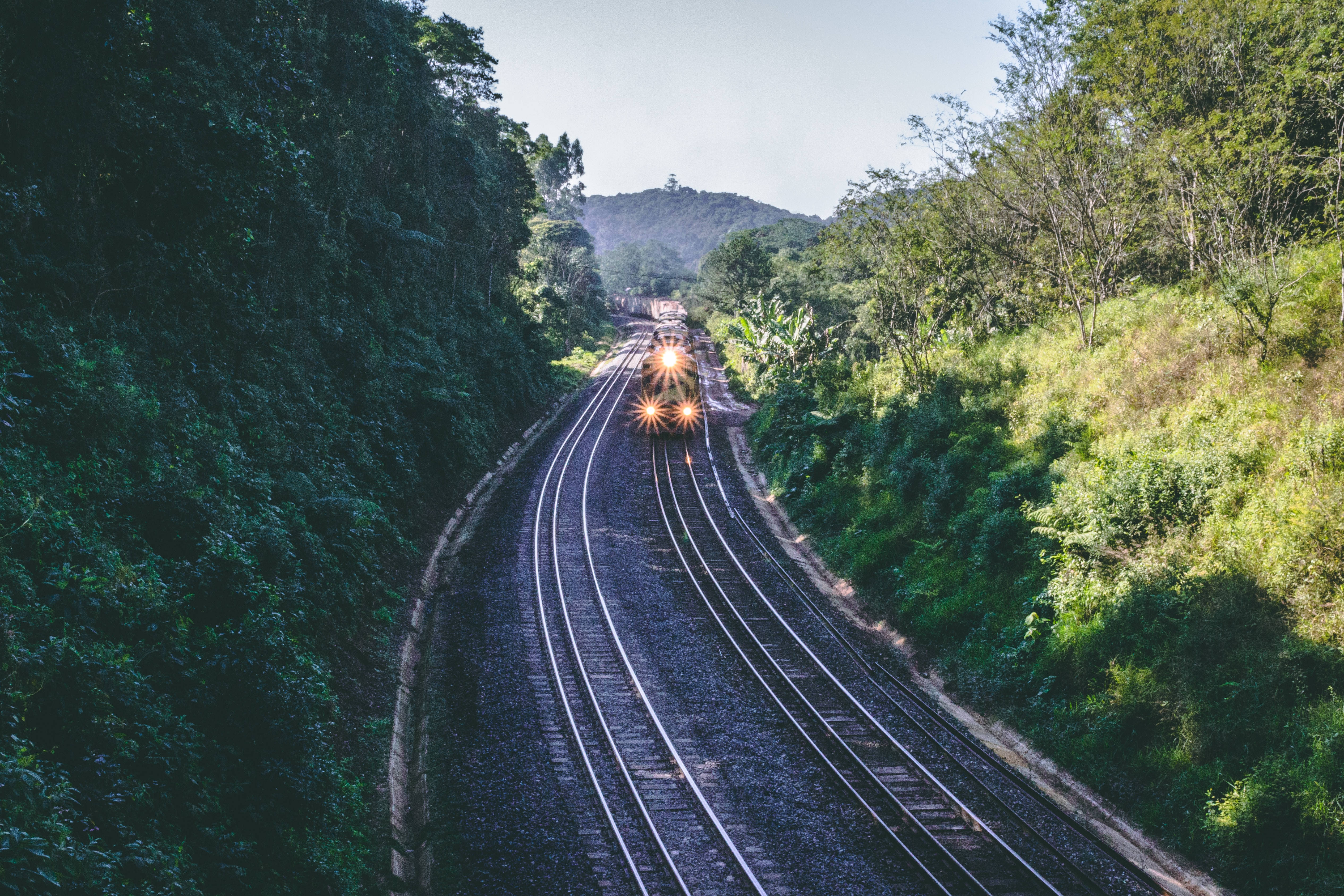 train, mountains, glowing headlights, 4K Desktop Wallpaper