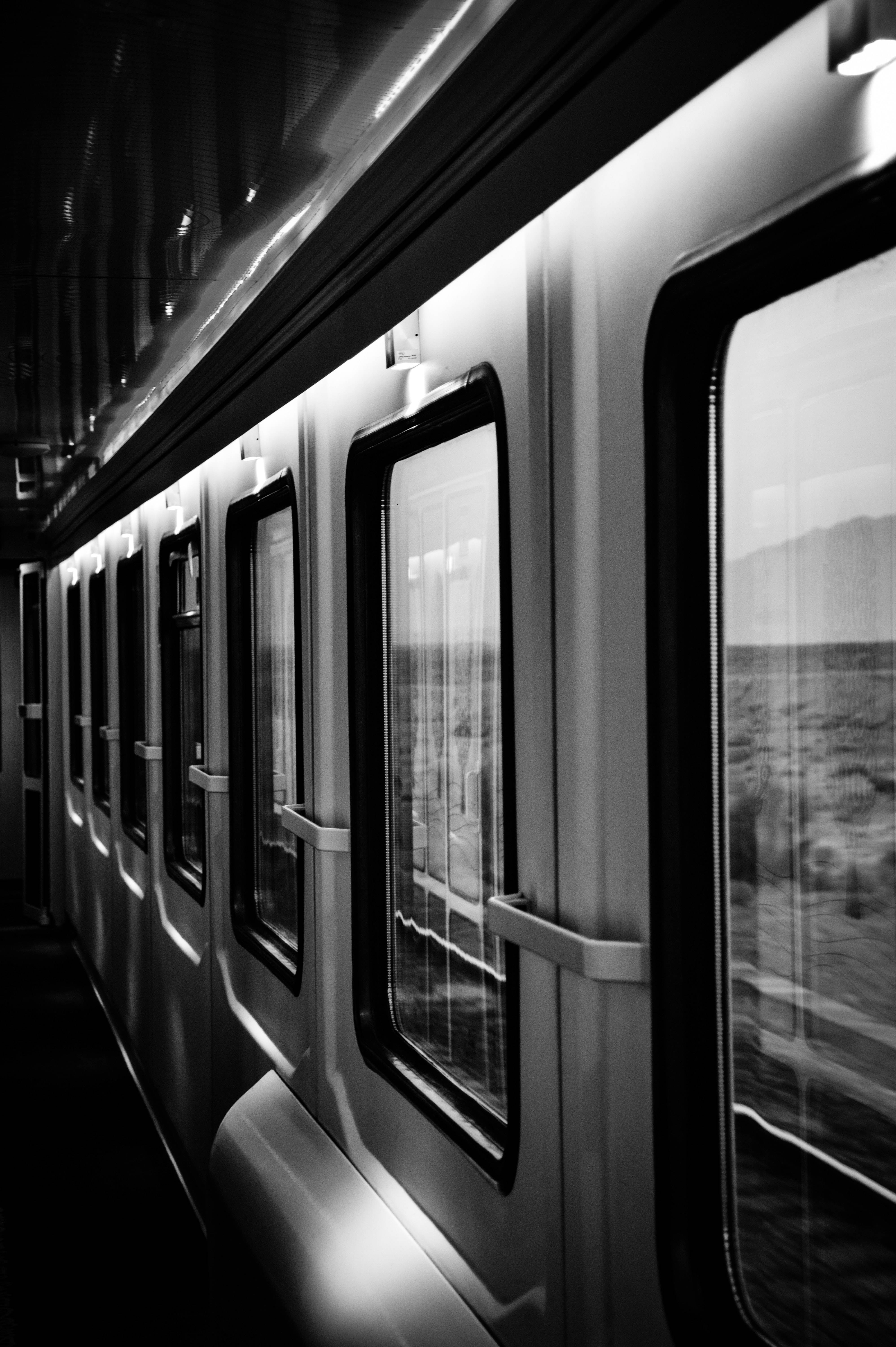 dark train, black and white interior, moving train, 5K Phone Wallpaper