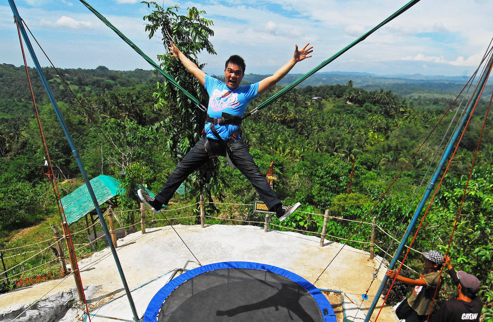 bungee trampoline, lush green jungle valley, bright blue sky, HD Desktop Wallpaper