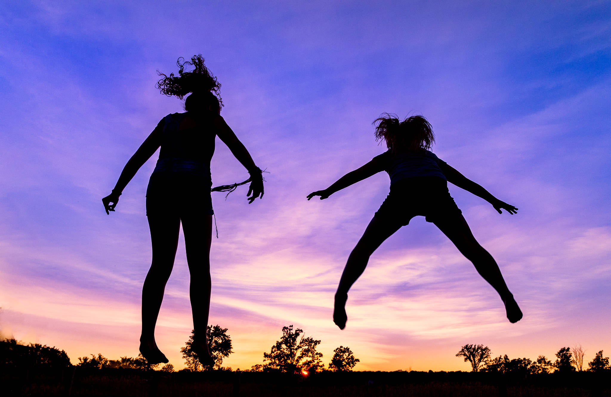 trampoline, silhouetted girls, vibrant purple, Full HD Desktop Wallpaper