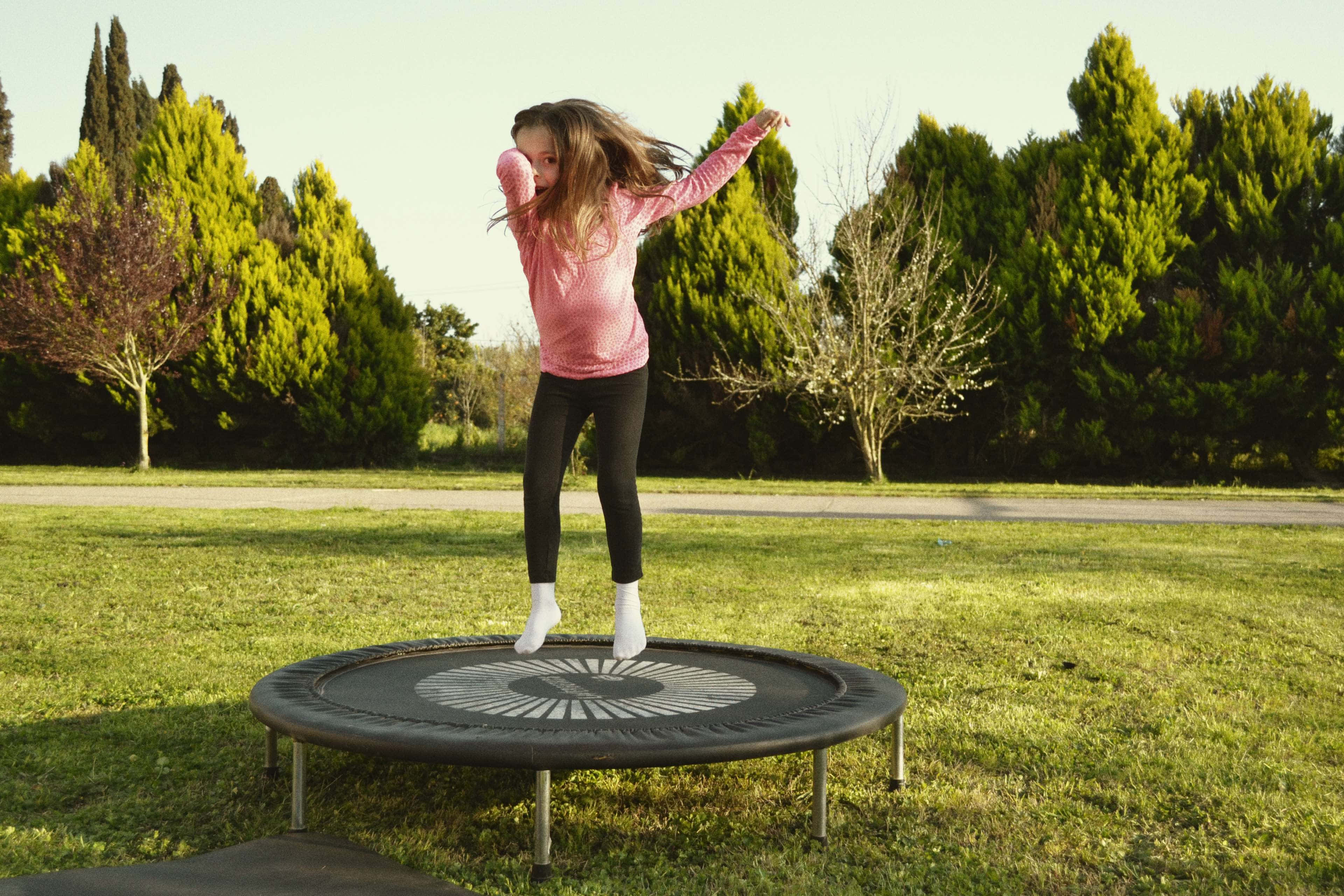 girl, pink sweater, trampoline, 4K Desktop Wallpaper