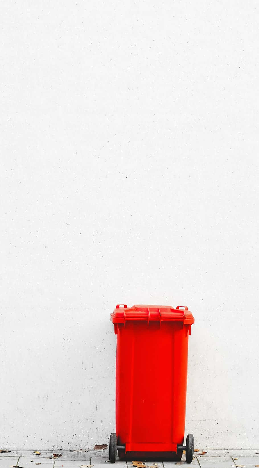 bright red wheelie trash can, stark white wall, tiled pavement, HD Phone Wallpaper