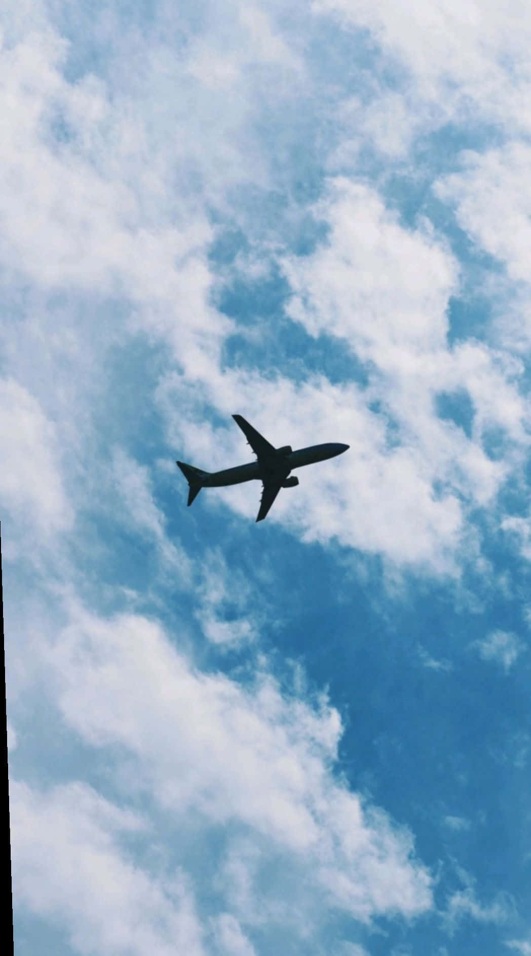 airplane silhouette, vibrant blue sky, fluffy white clouds, HD Phone Wallpaper