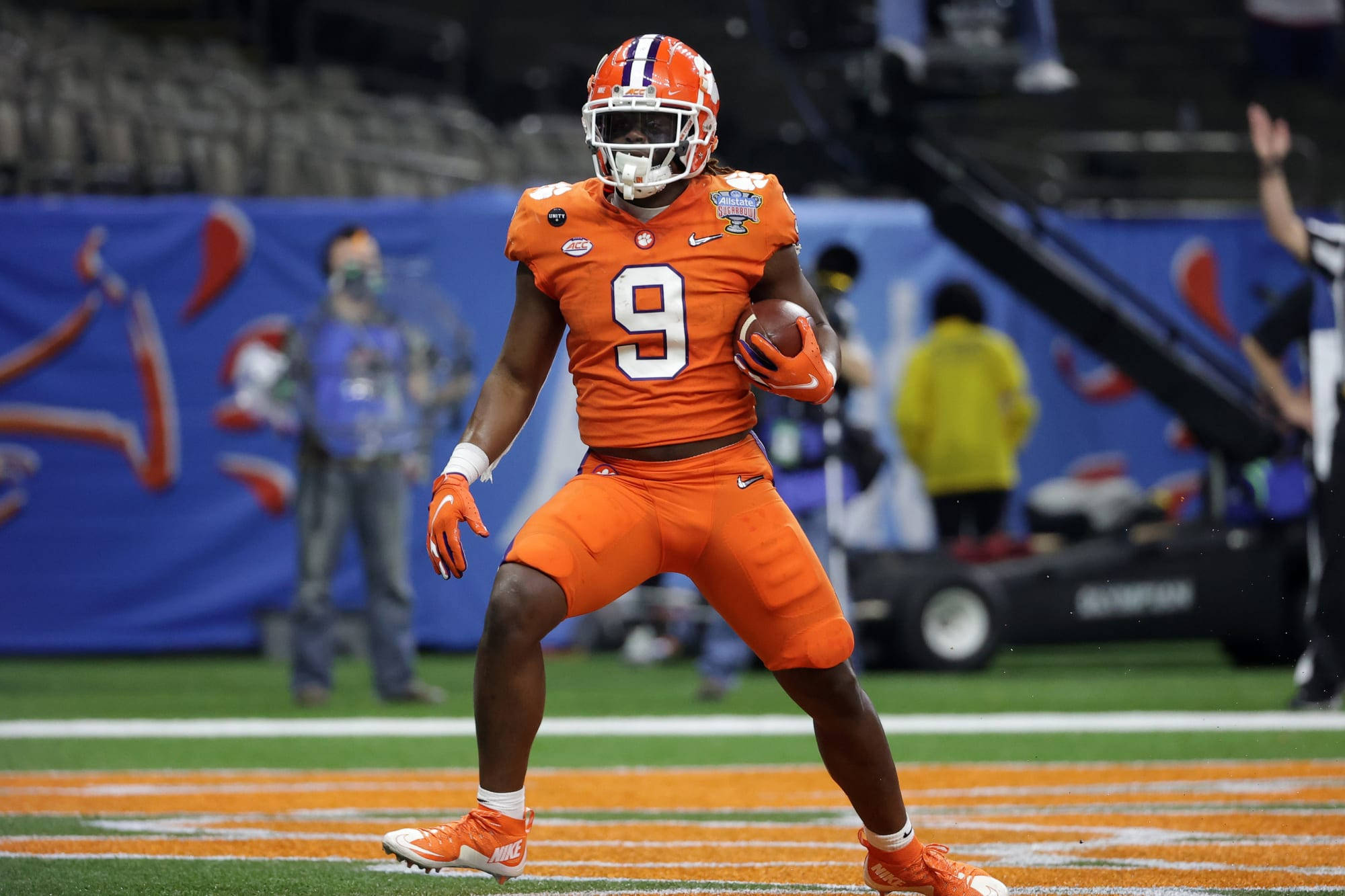 Travis Etienne Jr, orange uniform, number 9, Full HD Desktop Wallpaper