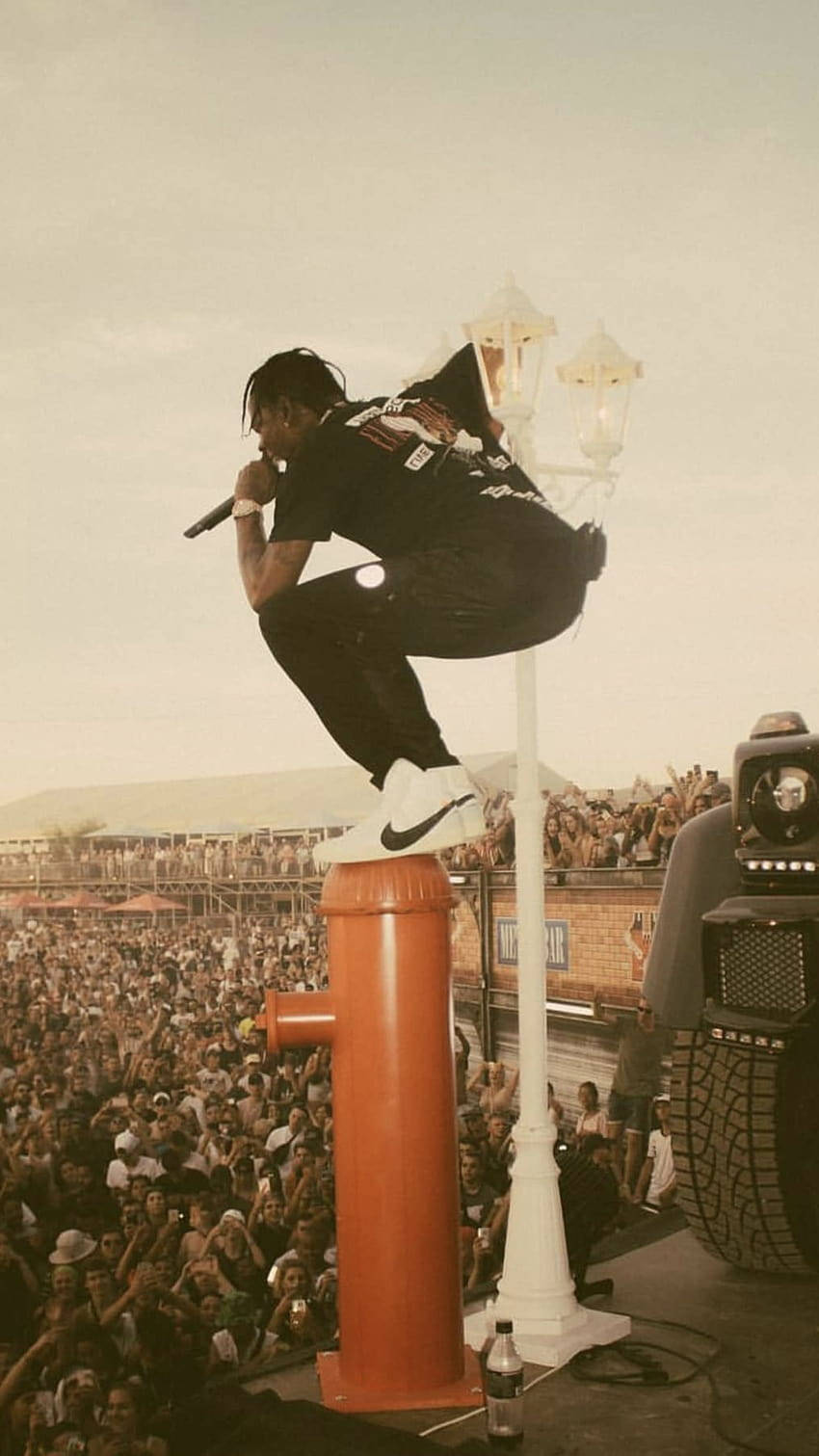Travis Scott Aesthetic, bright orange fire hydrant, massive cheering crowd, HD Phone Wallpaper