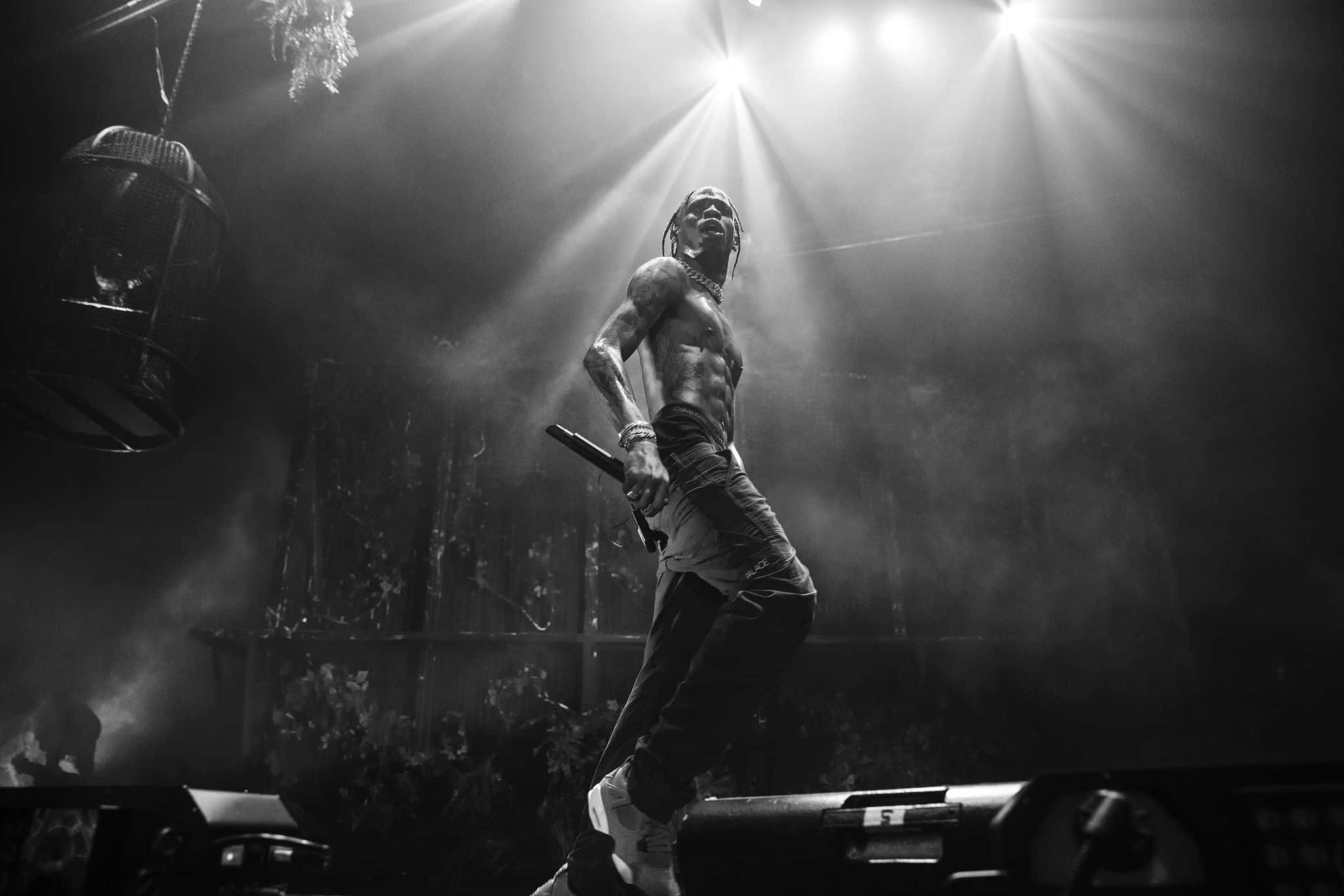 Travis Scott Concert, shirtless performer, dramatic spotlights, Full HD Desktop Wallpaper