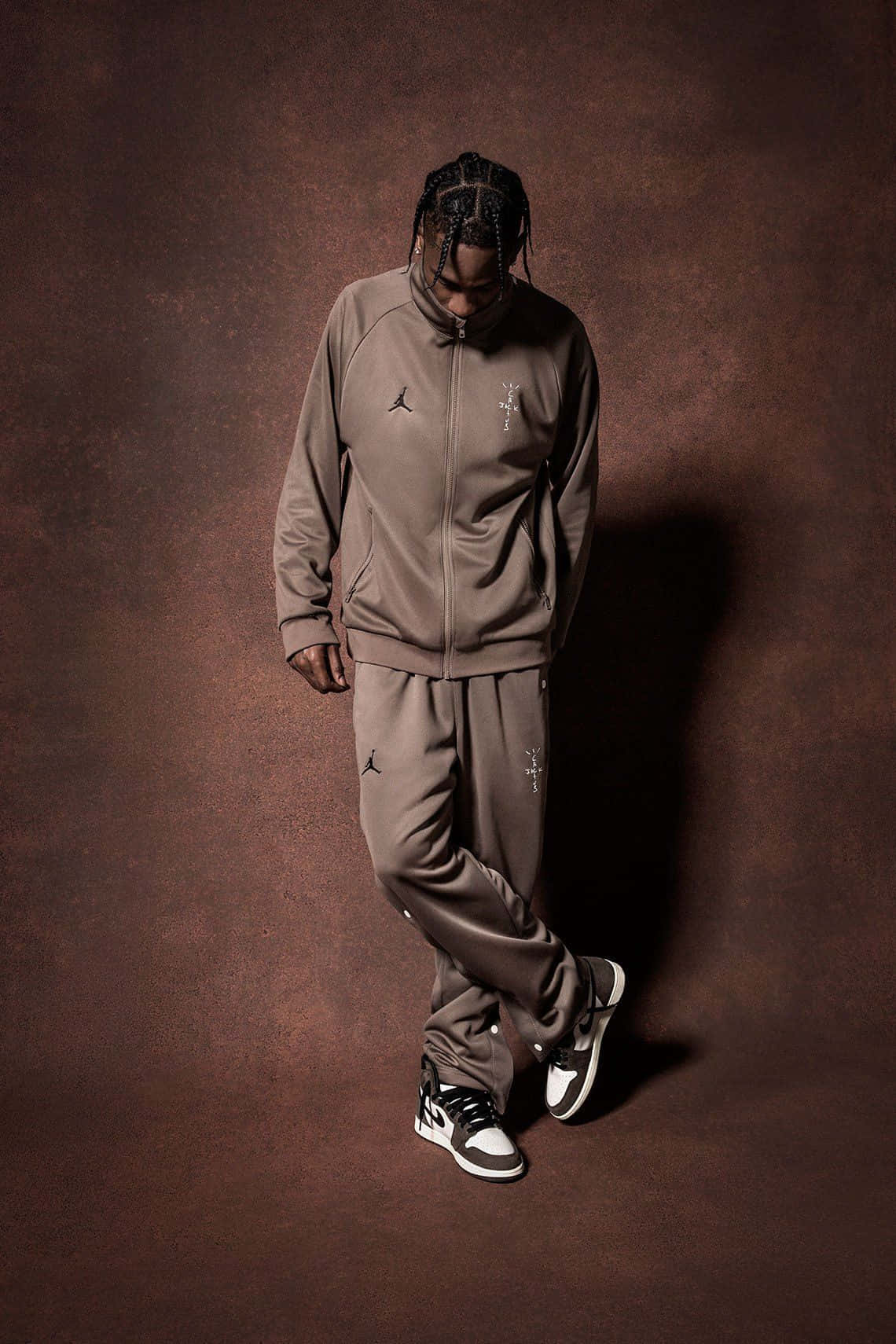 Travis Scott Jordan 1, muted brown tracksuit, textured brown backdrop, HD Phone Wallpaper