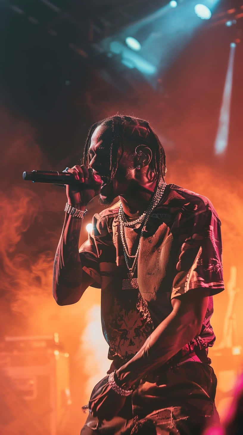 Travis Scott, live on stage, vibrant orange and blue stage lights, HD Phone Wallpaper