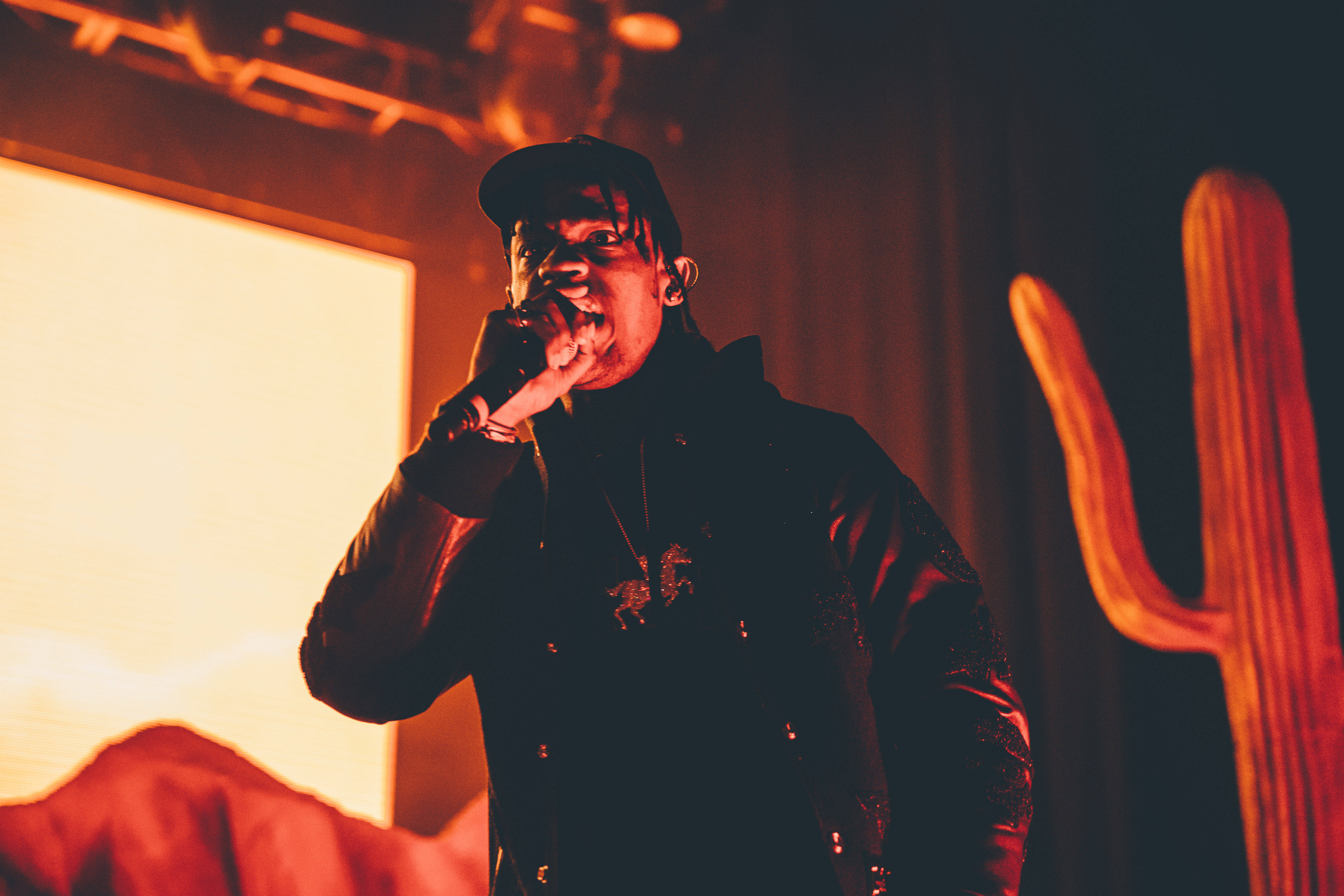 Travis Scott, stage, warm orange lights, 5K Desktop Wallpaper