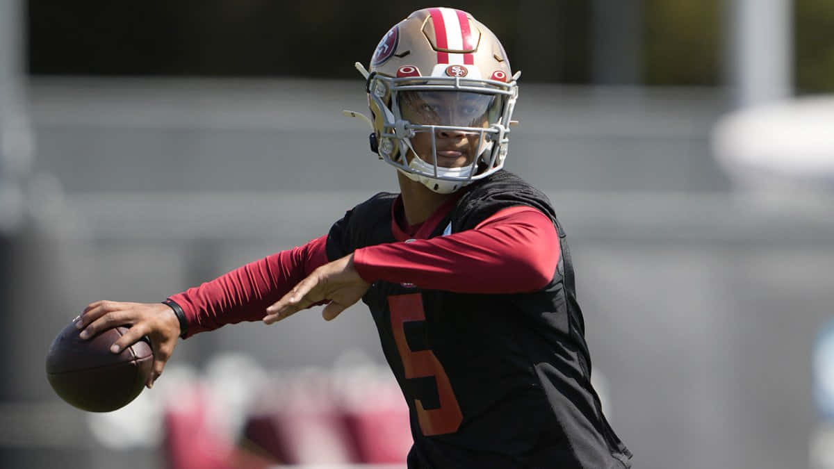 Trey Lance, quarterback, red and gold gear, SD Desktop Wallpaper