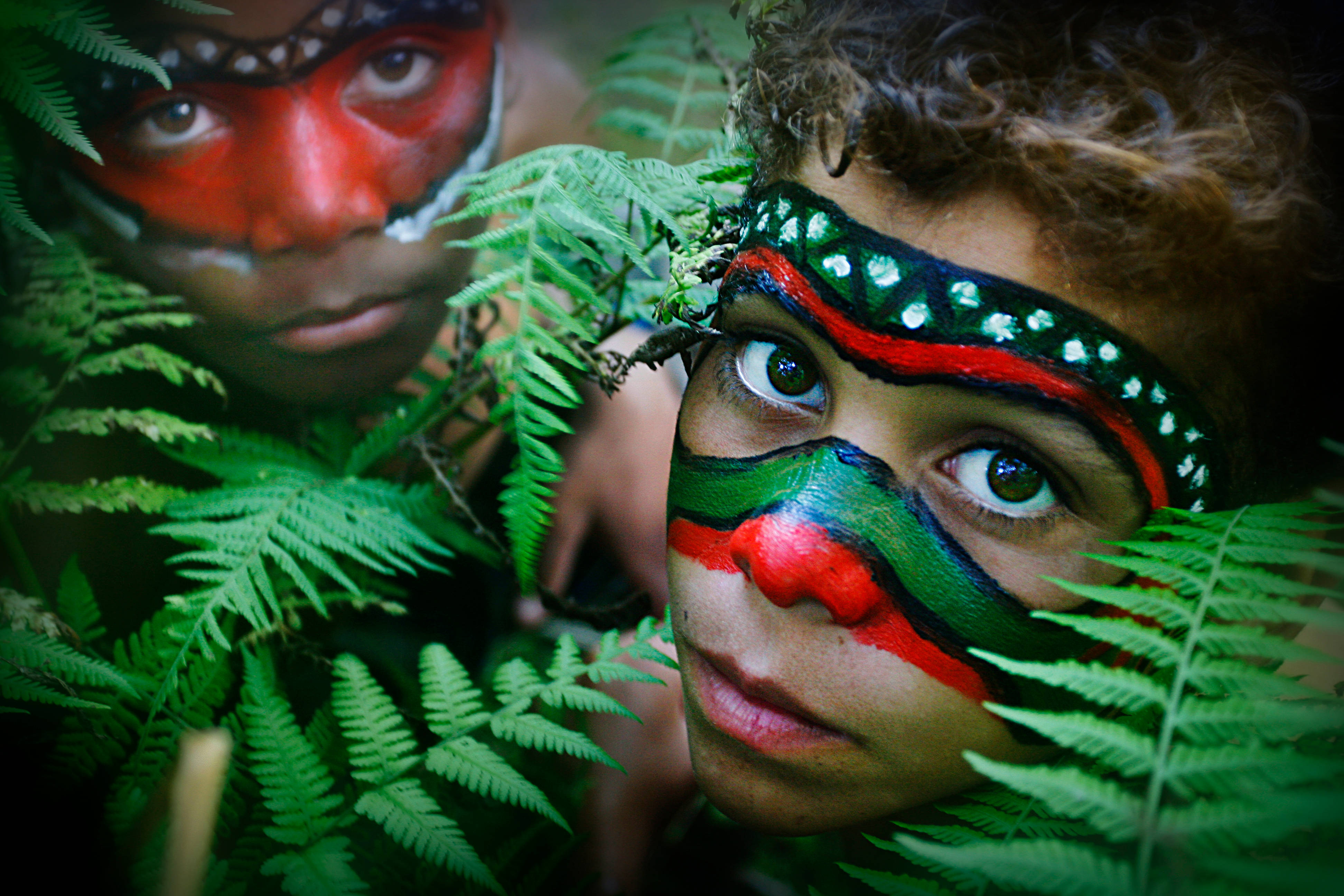 indigenous children, tribal facepaint, vibrant red green and black, 4K Desktop Wallpaper