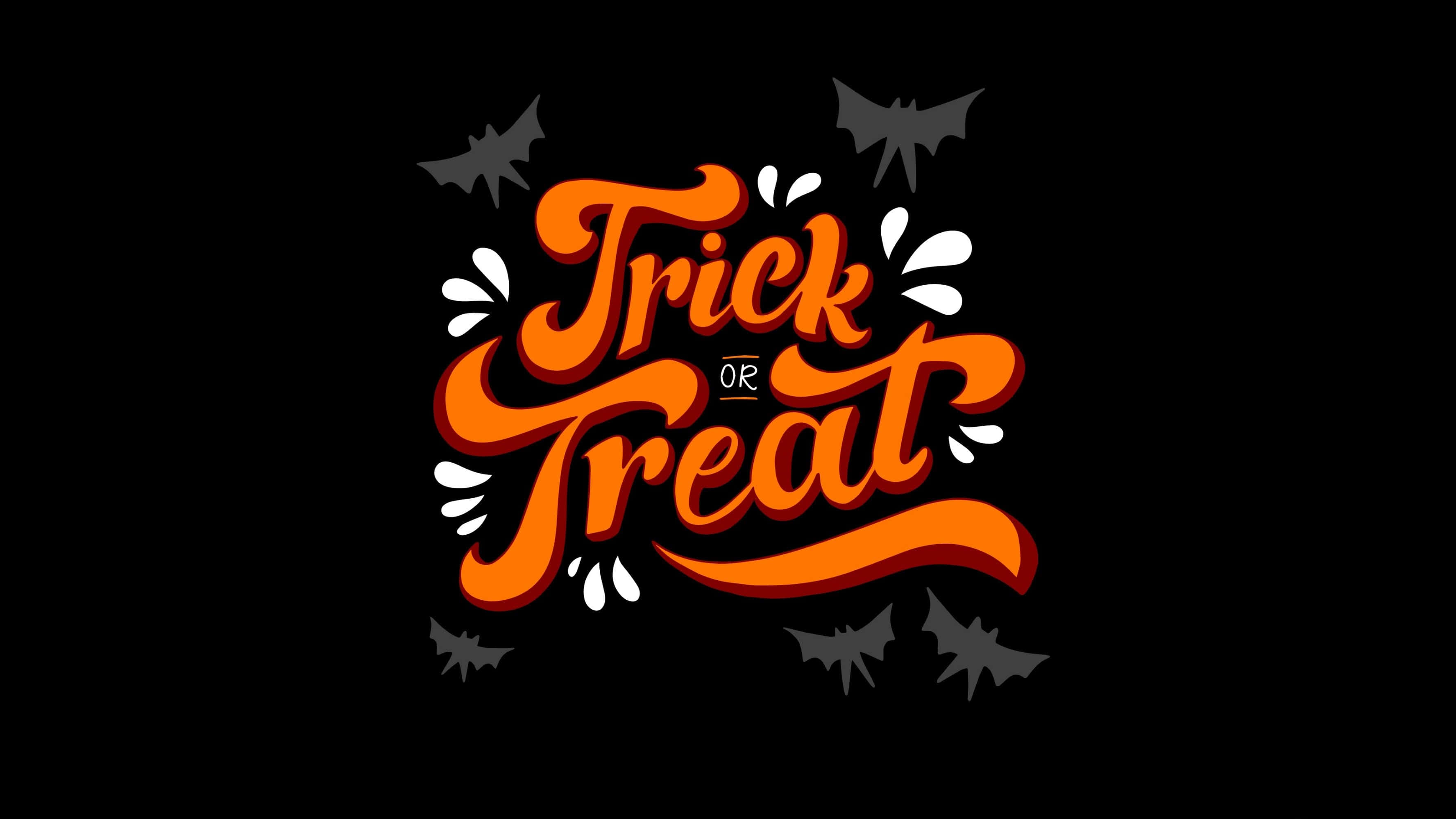 Trick or Treat, black background, bold orange lettering, 2K Desktop Wallpaper