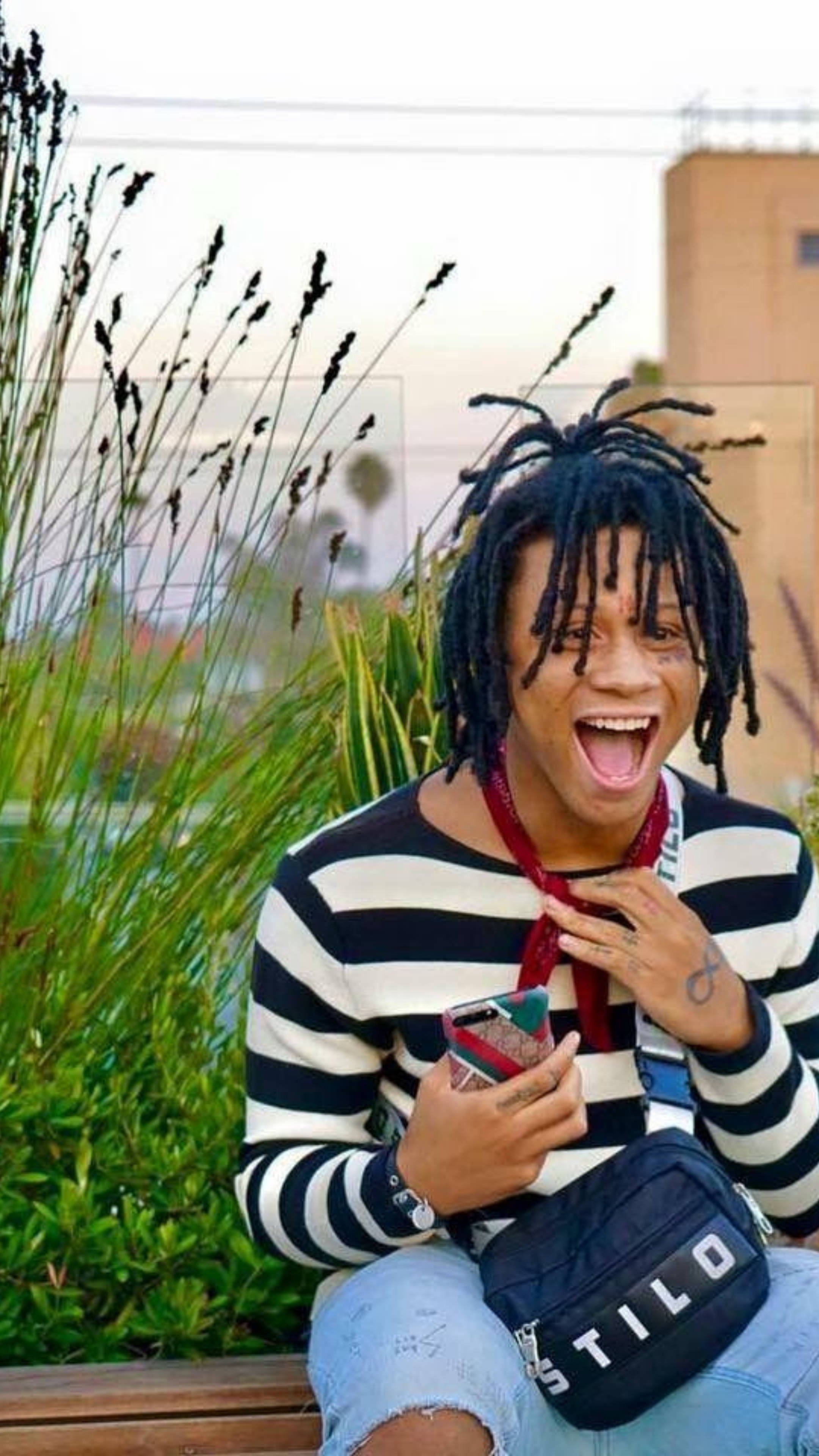 Trippie Redd, black dreadlocks, bench, 4K Phone Wallpaper