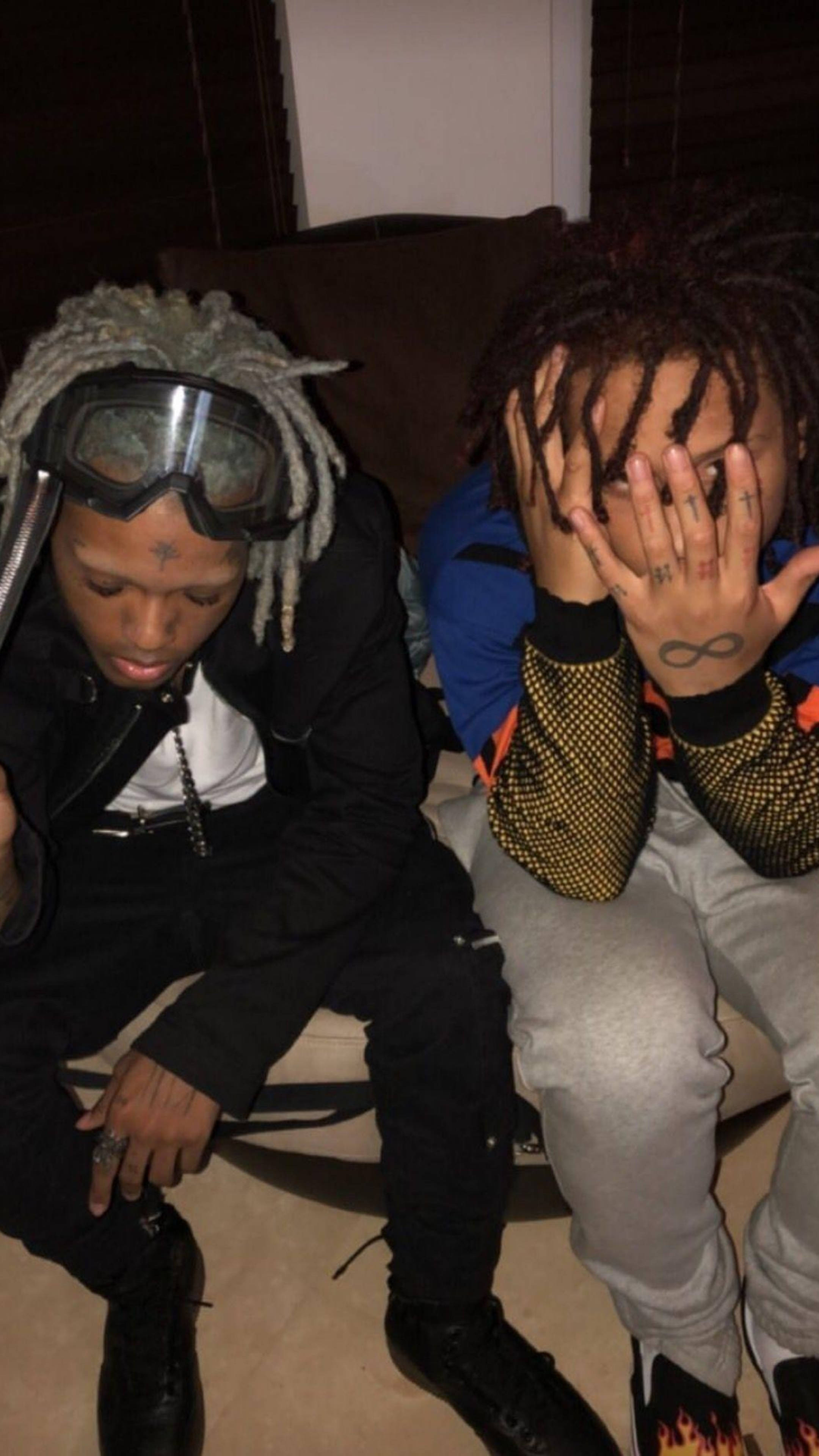Trippie Redd, dreadlocks, couch, 4K Phone Wallpaper