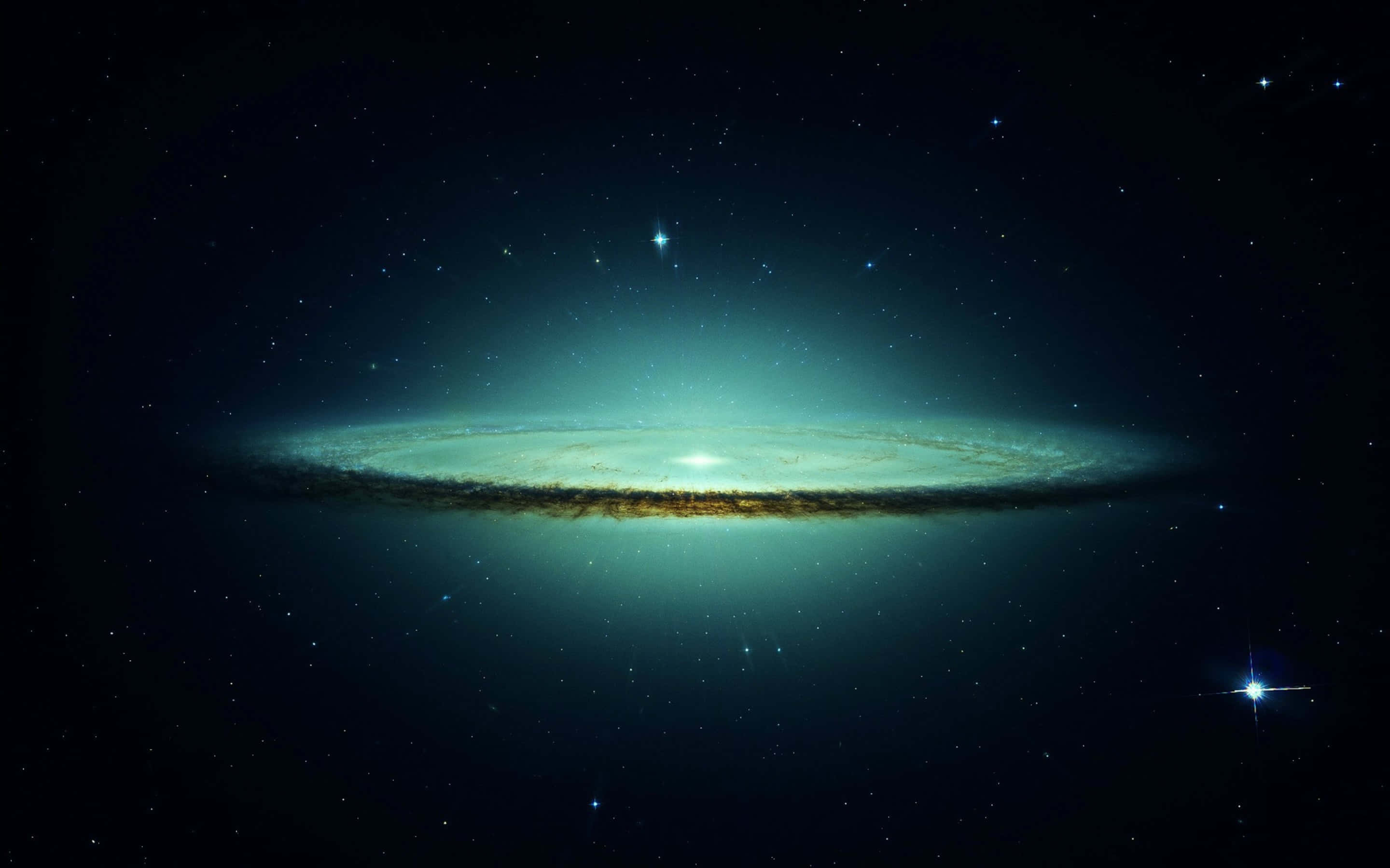 Trippy Space, luminous spiral galaxy, teal and gold hues, 2K Desktop Wallpaper