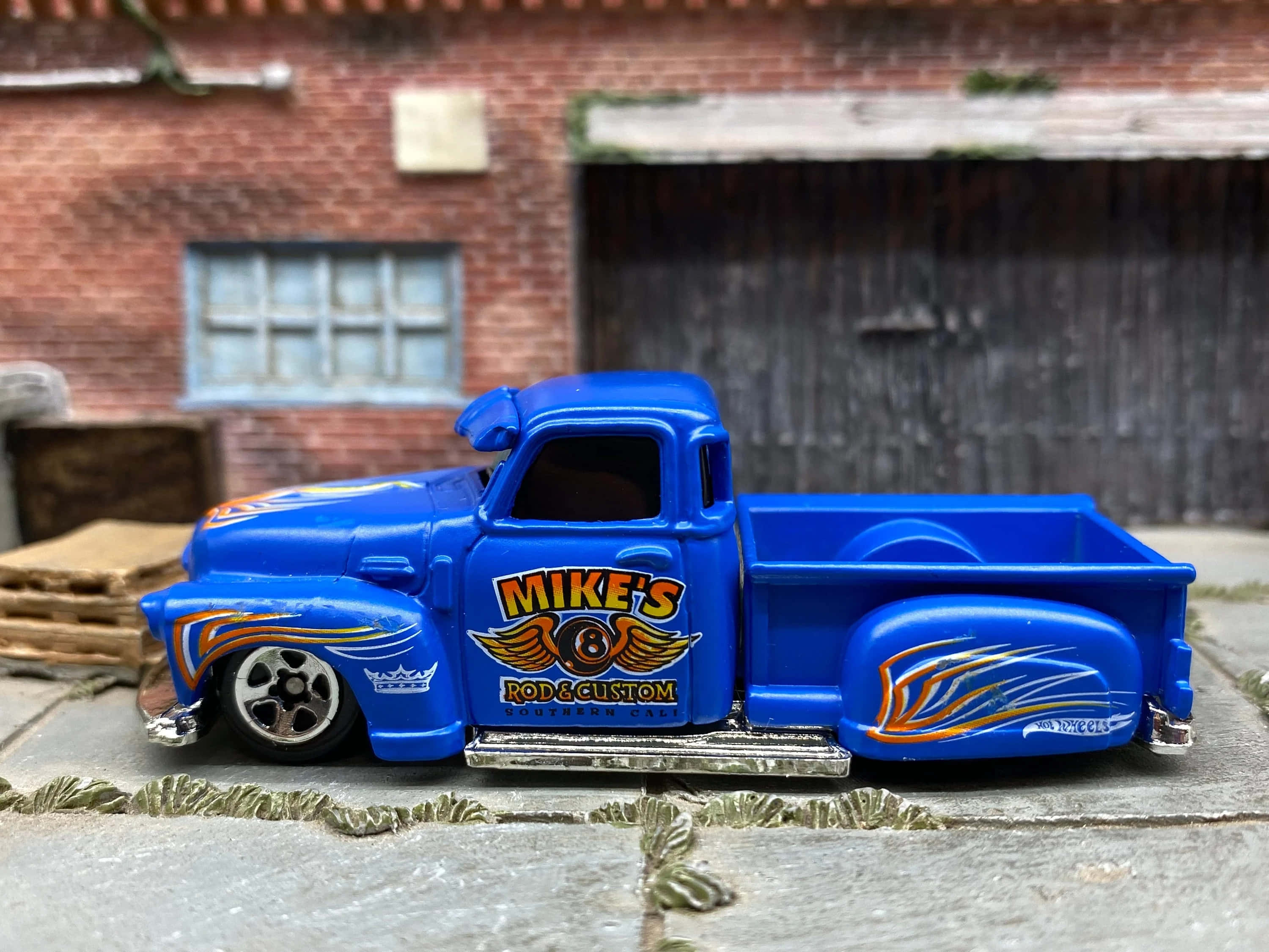custom blue pickup toy truck, orange flame decals, stone path, 2K Desktop Wallpaper