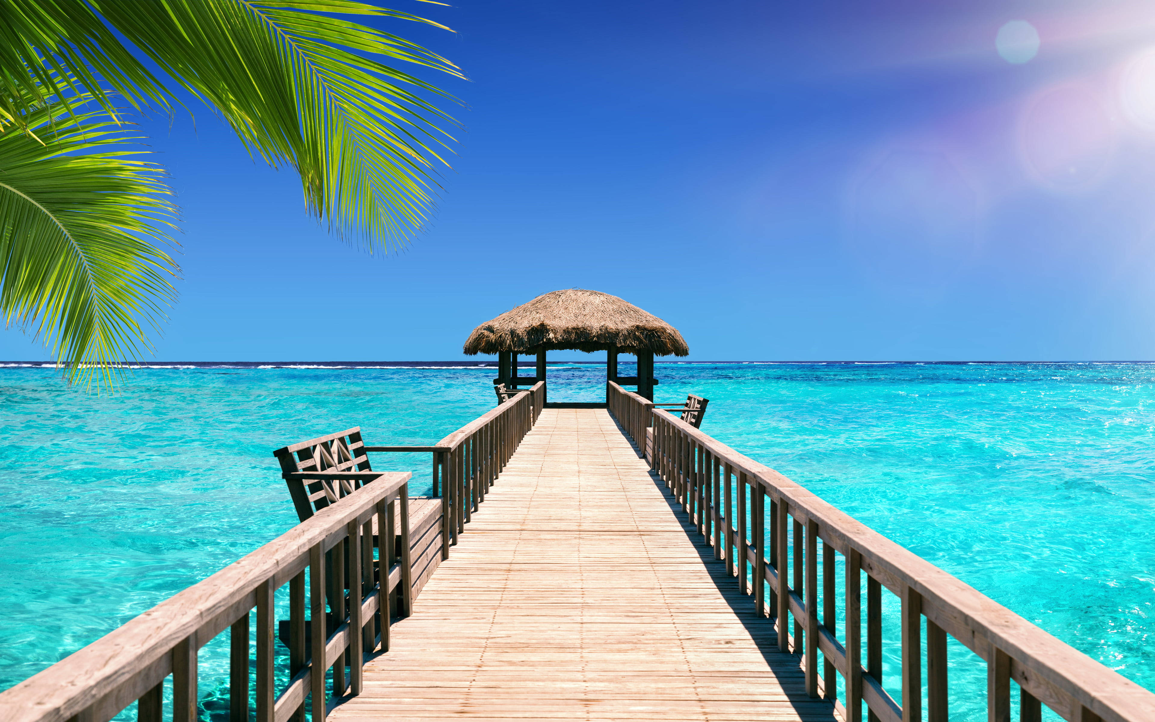 long wooden pier, crystal turquoise water, bright blue sky, 4K Desktop Wallpaper
