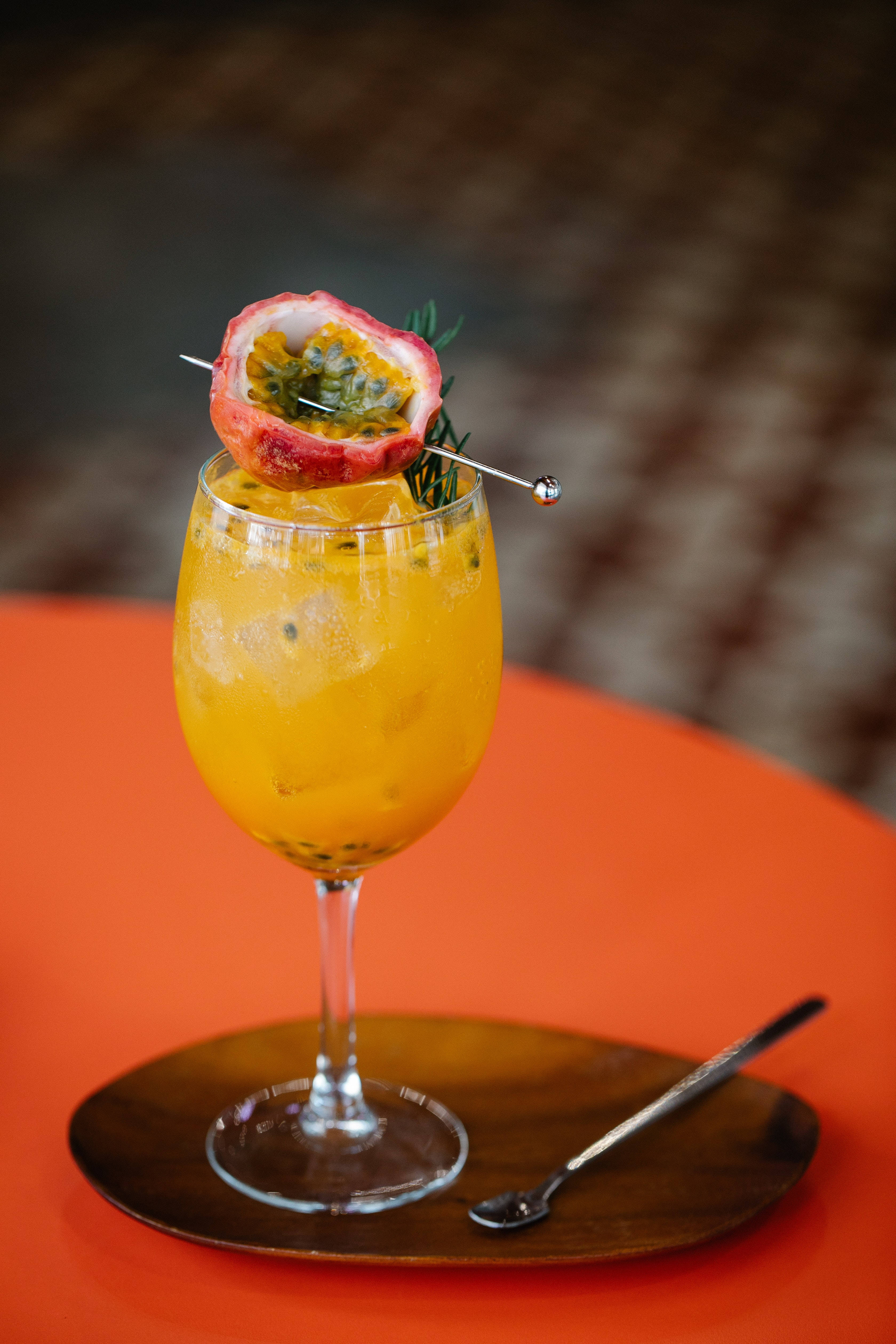 passion fruit cocktail, wine glass, wooden tray, 4K Phone Wallpaper