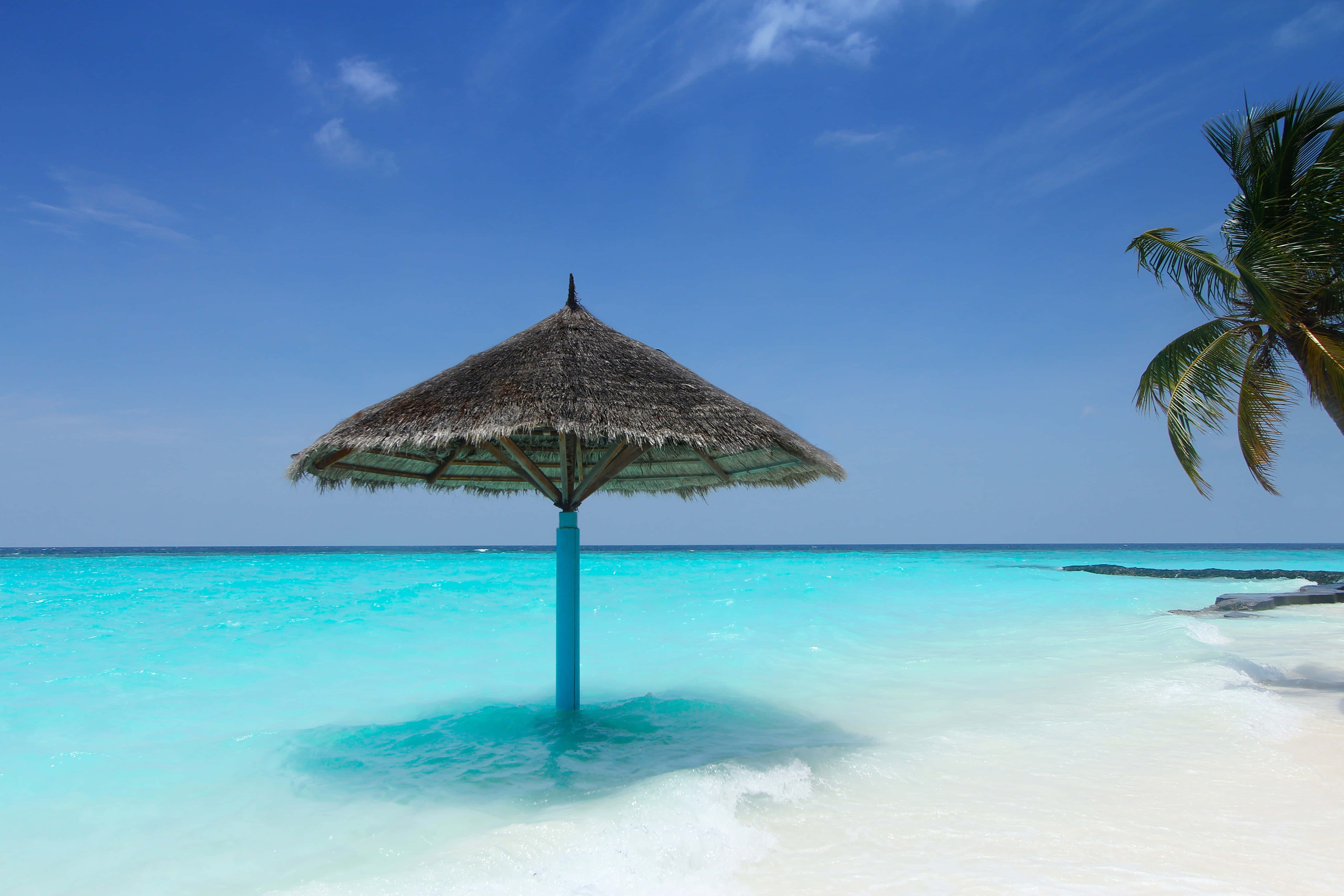 thatched umbrella, crystal clear turquoise water, white sand beach, 5K Desktop Wallpaper