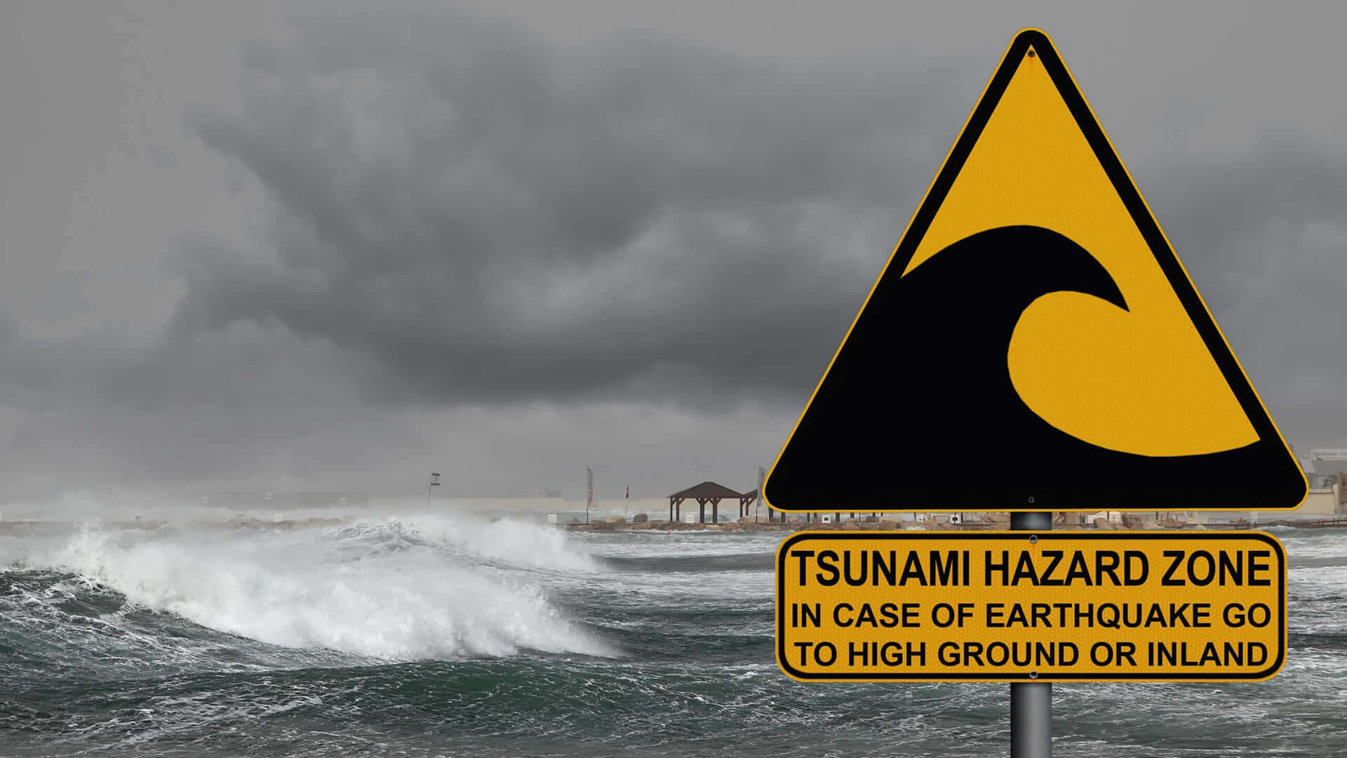 yellow triangular tsunami warning sign, churning ocean waves, stormy gray sky, Full HD Desktop Wallpaper