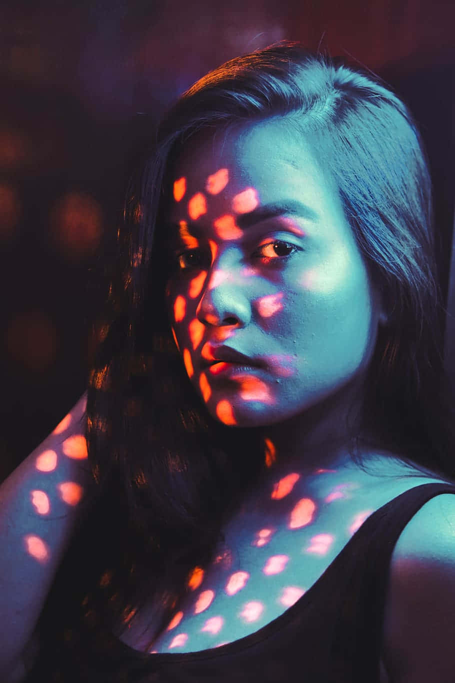 vibrant blue, orange light patterns, dimly lit setting, HD Phone Wallpaper