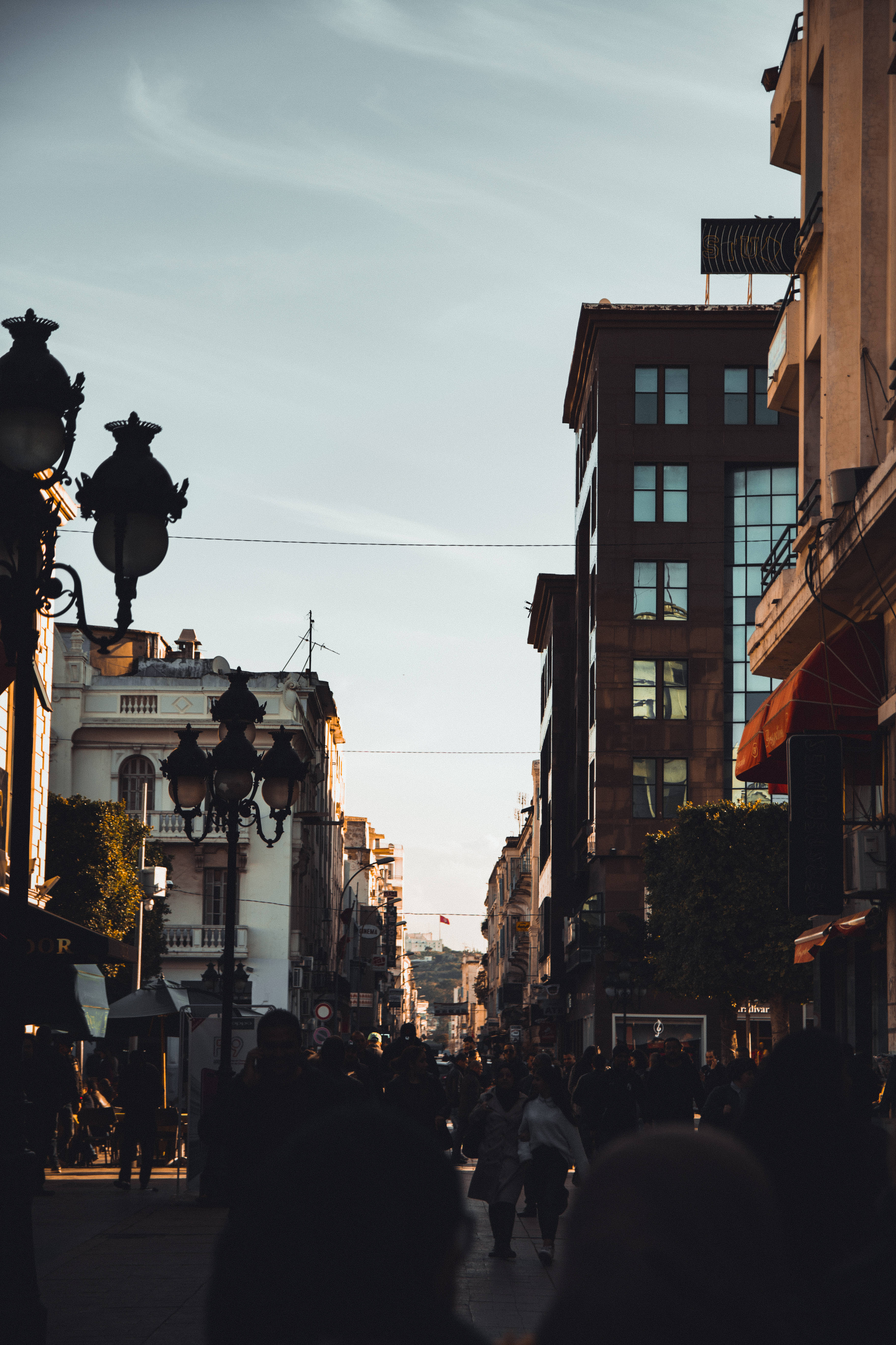 Tunisia, golden hour, bustling city street, 5K Phone Wallpaper
