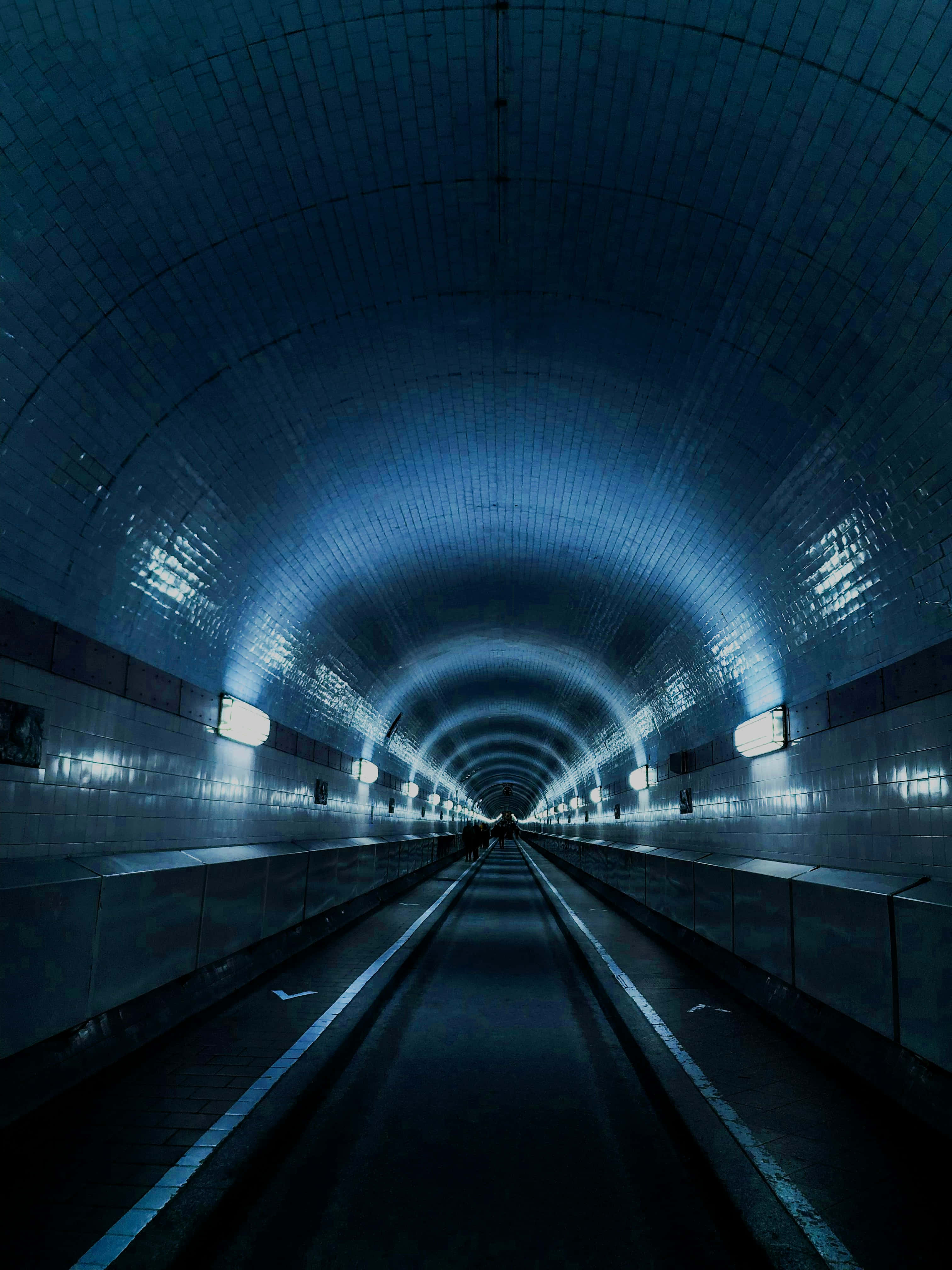 illuminated underground tunnel, cool blue light, arched subway tunnel, 4K Phone Wallpaper