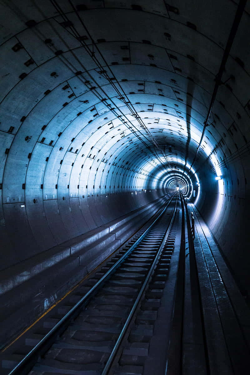 futuristic subway tunnel, glowing blue lights, concrete subway tunnel, SD Phone Wallpaper