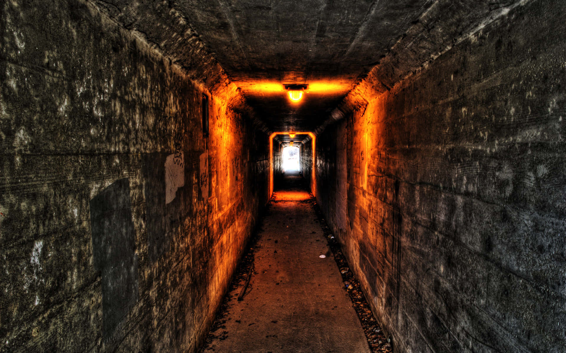 dimly lit concrete tunnel, orange bulb, rough walls, Full HD Desktop Wallpaper