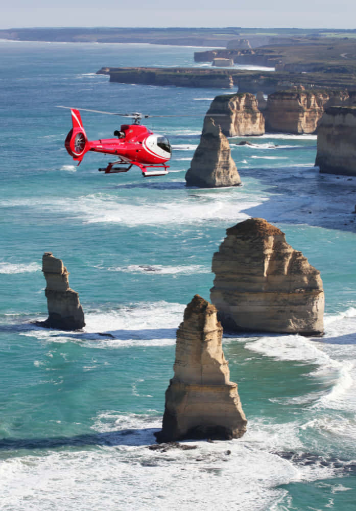Twelve Apostles, red helicopter, turquoise waters, SD Phone Wallpaper