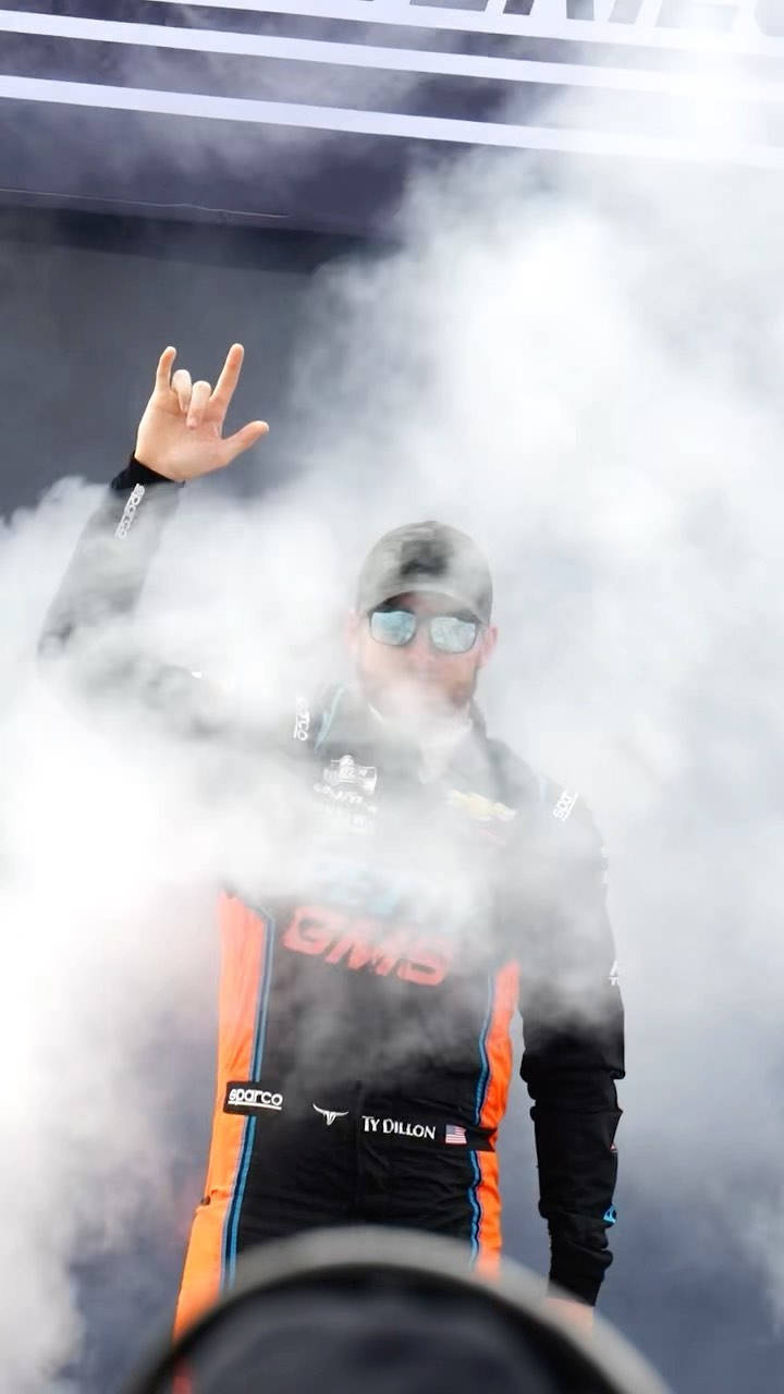 Ty Dillon, black and orange suit, rock hand gesture, HD Phone Wallpaper