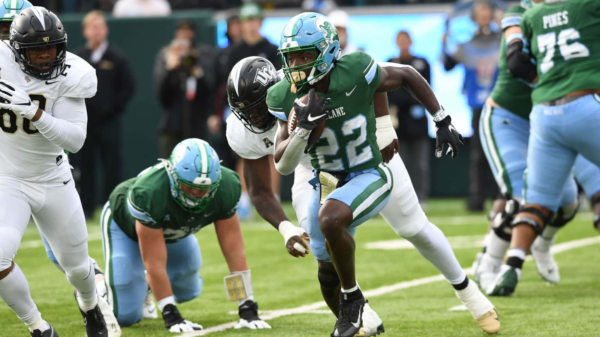 Tyjae Spears, number 22, green and light blue football player, Full HD Desktop Wallpaper