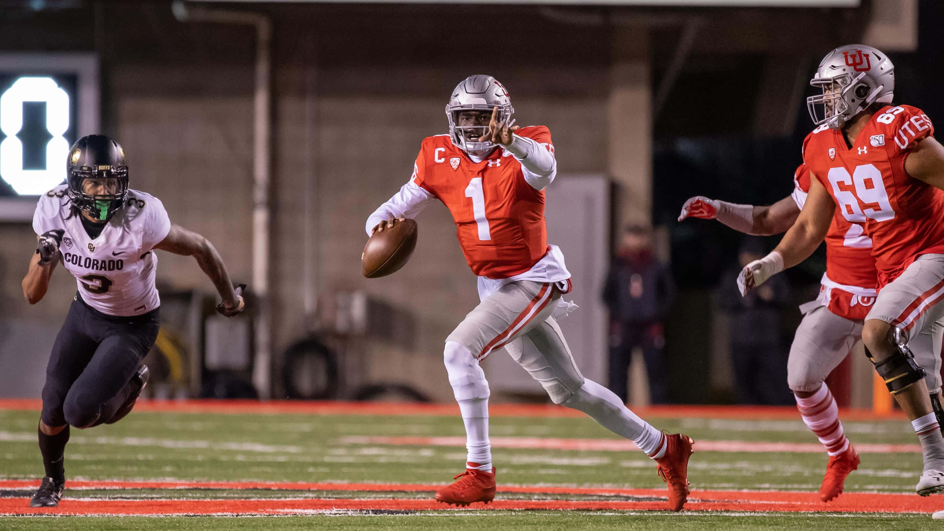 Tyler Huntley, red jersey number one, stadium lights, 2K Desktop Wallpaper