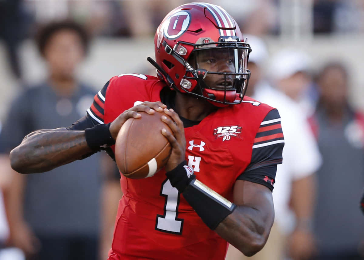 Tyler Huntley, quarterback, red uniform, SD Desktop Wallpaper