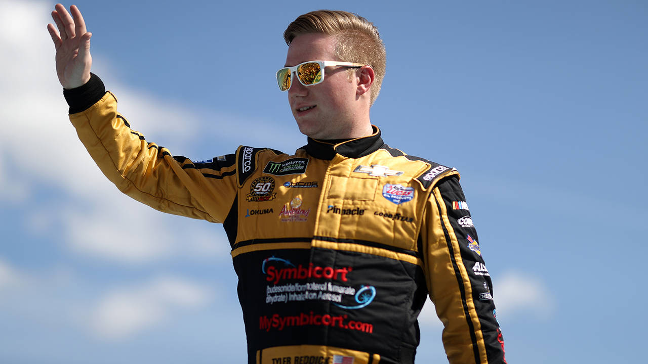 Tyler Reddick, yellow and black suit, bright blue sky, HD Desktop Wallpaper